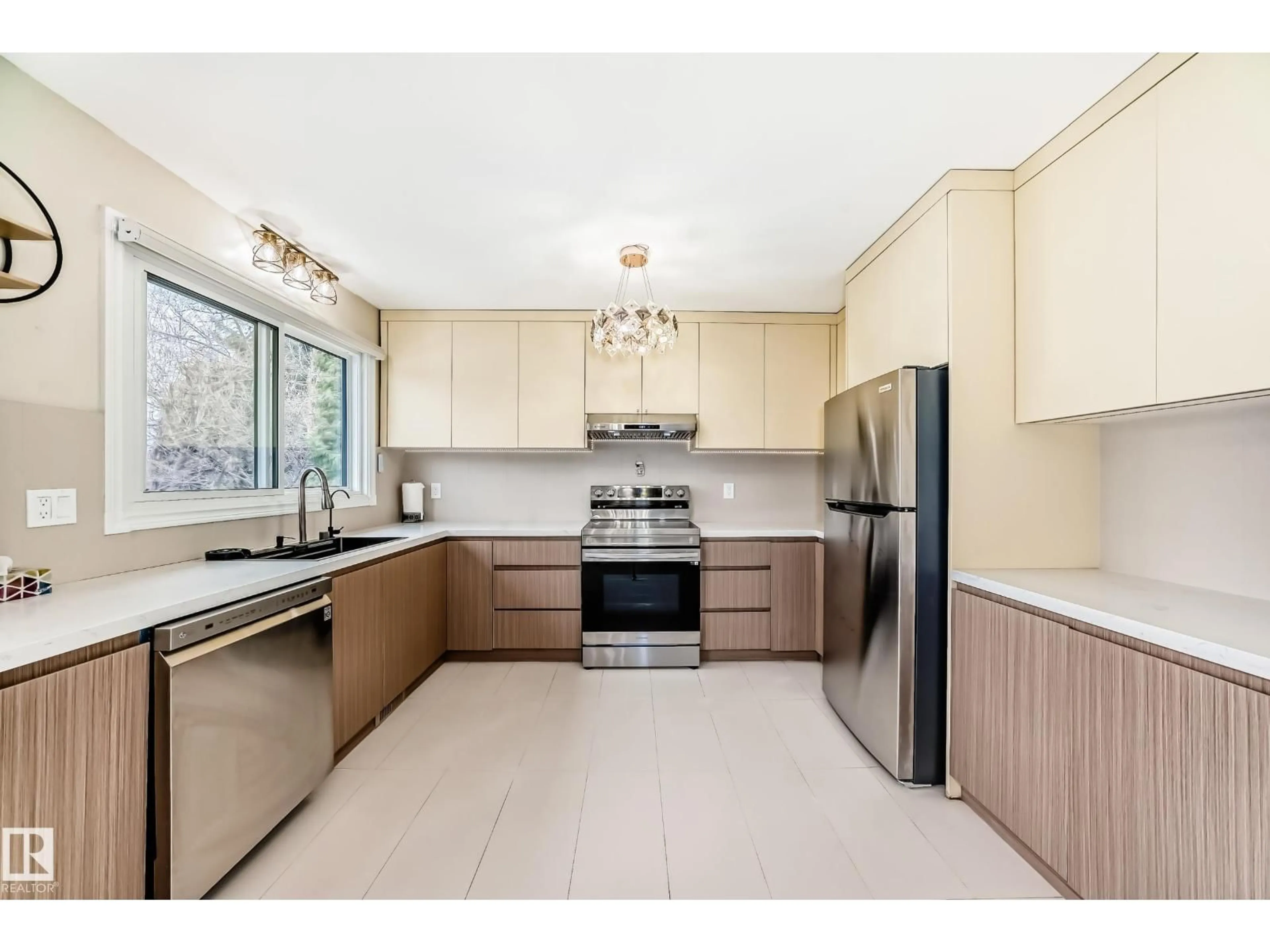 Open concept kitchen, ceramic/tile floor for 2039 48 ST, Edmonton Alberta T6L2W5