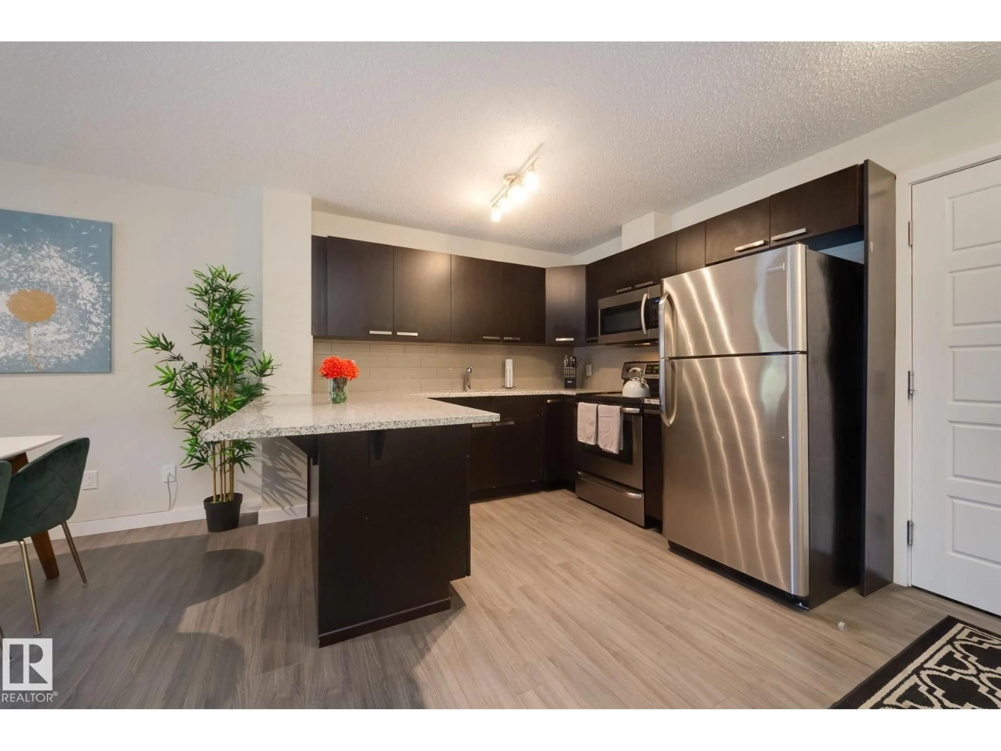 Standard kitchen, wood/laminate floor for #116 - 14808 125 ST NW, Edmonton Alberta T5X0G1