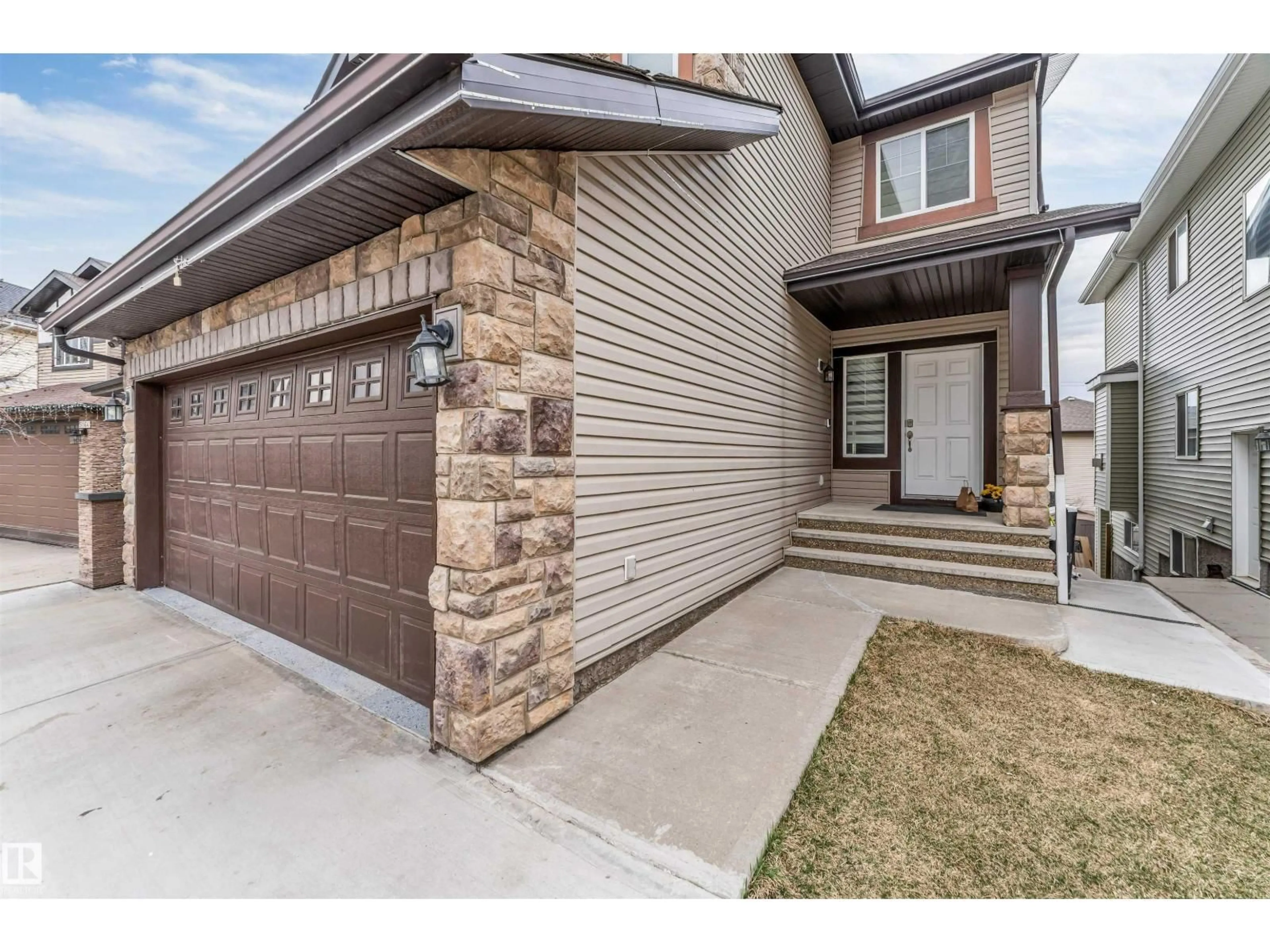 Home with brick exterior material, street for SW - 5156 2 AV, Edmonton Alberta T6X0R4