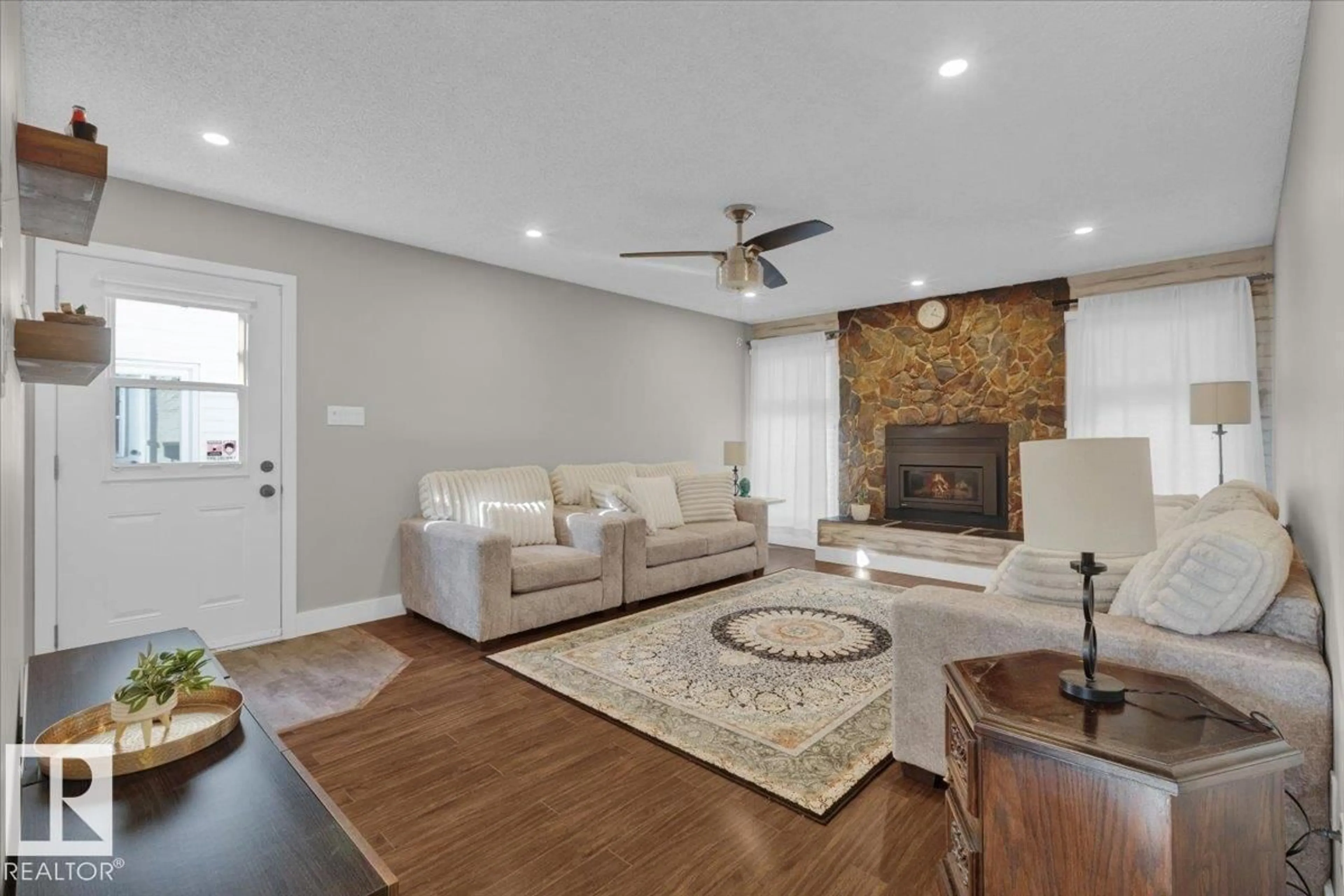 Living room with furniture, unknown for 3515 20 AV, Edmonton Alberta T6L3E2