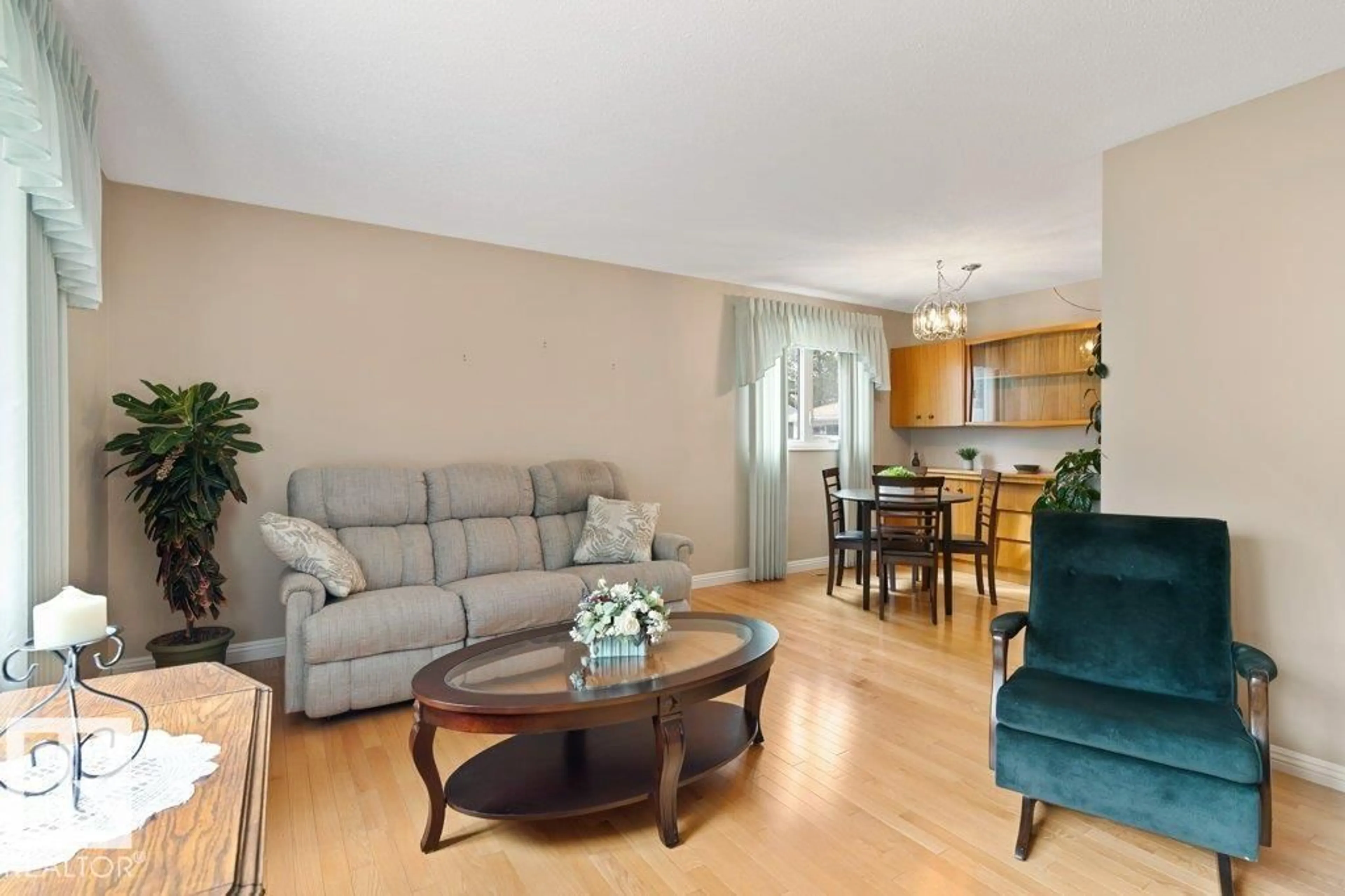 Living room with furniture, wood/laminate floor for 33 FENWICK CR, St. Albert Alberta T8N1W5