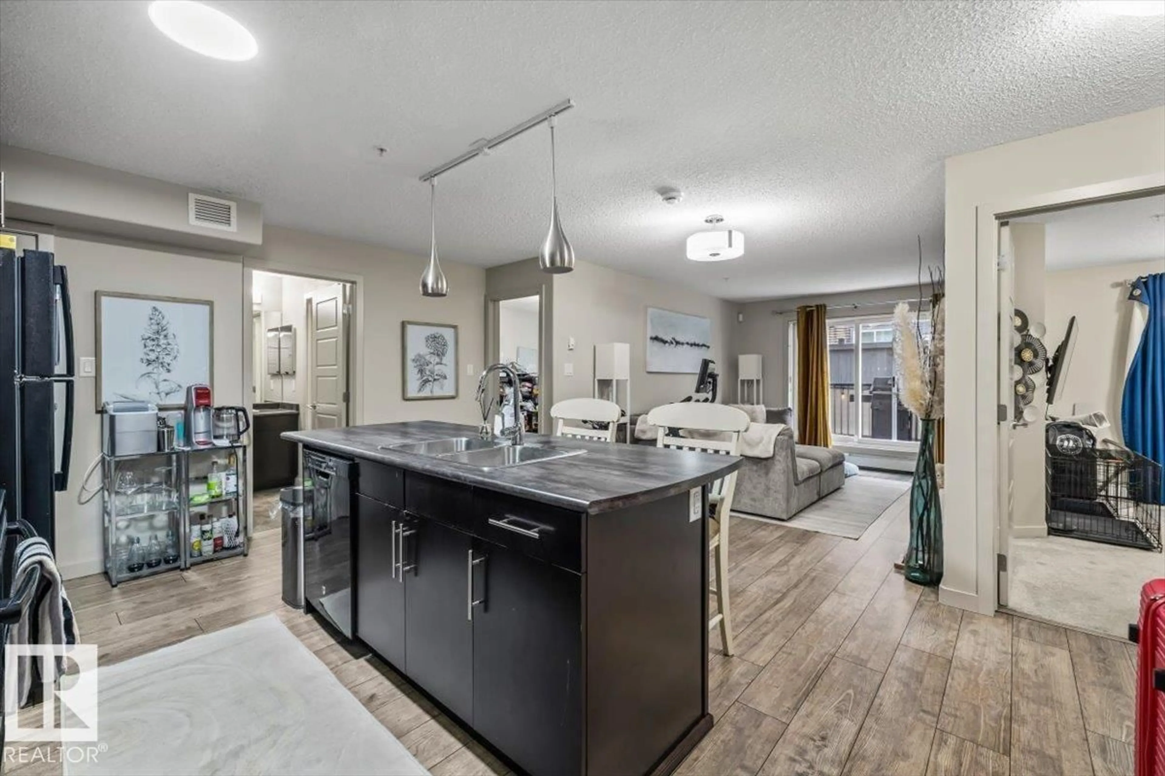 Open concept kitchen, unknown for #113 - 5510 SCHONSEE DR, Edmonton Alberta T5Z0N9