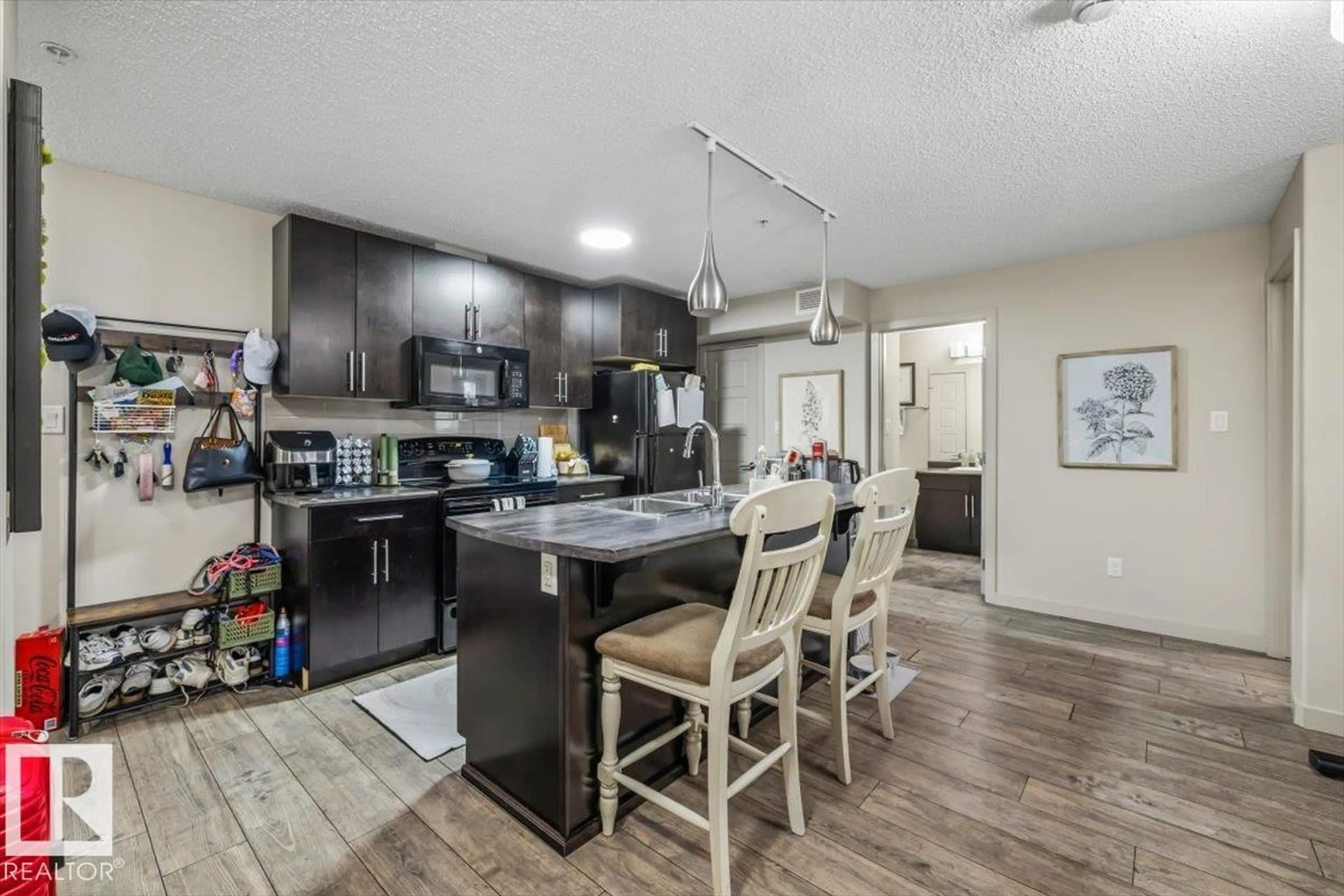 Open concept kitchen, unknown for #113 - 5510 SCHONSEE DR, Edmonton Alberta T5Z0N9