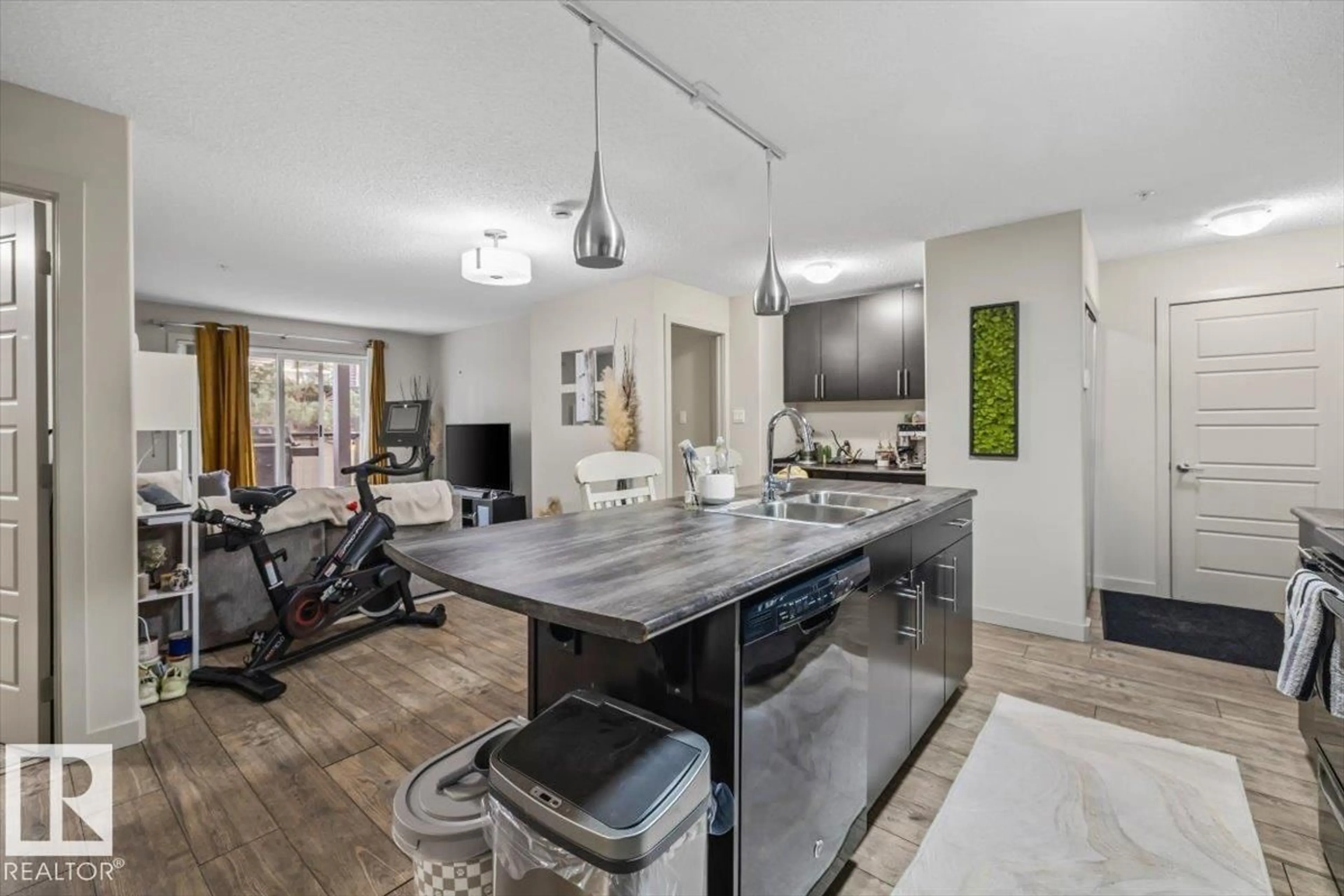 Open concept kitchen, unknown for #113 - 5510 SCHONSEE DR, Edmonton Alberta T5Z0N9
