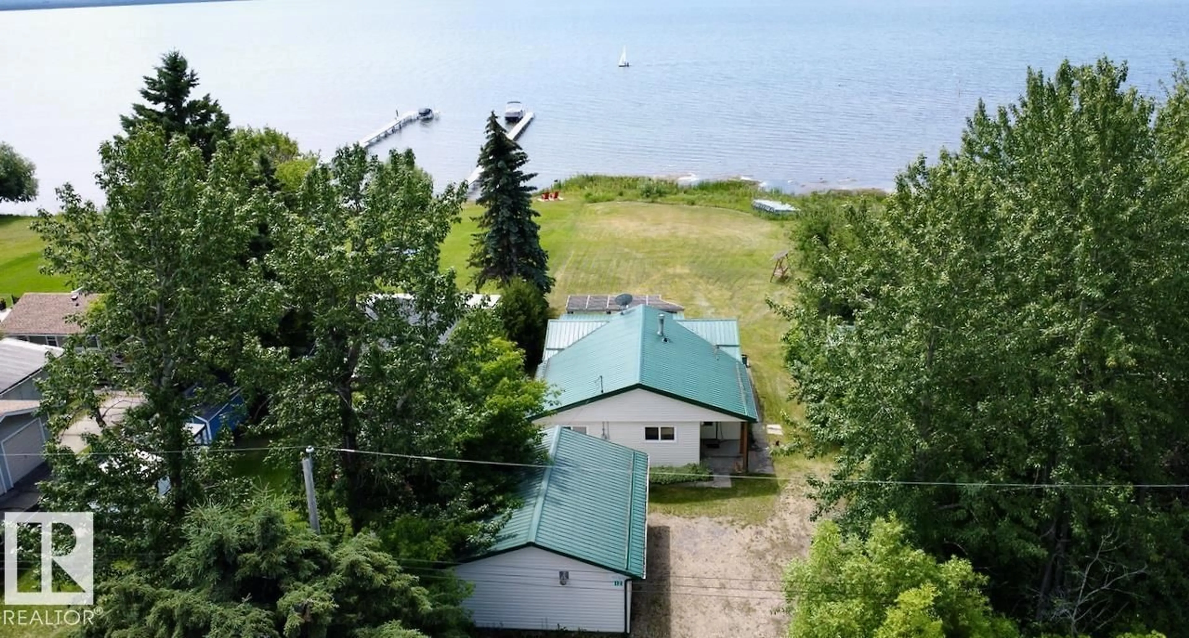 A pic from outside/outdoor area/front of a property/back of a property/a pic from drone, water/lake/river/ocean view for 12 53026 RGE ROAD 43, Rural Parkland County Alberta T0E2K0