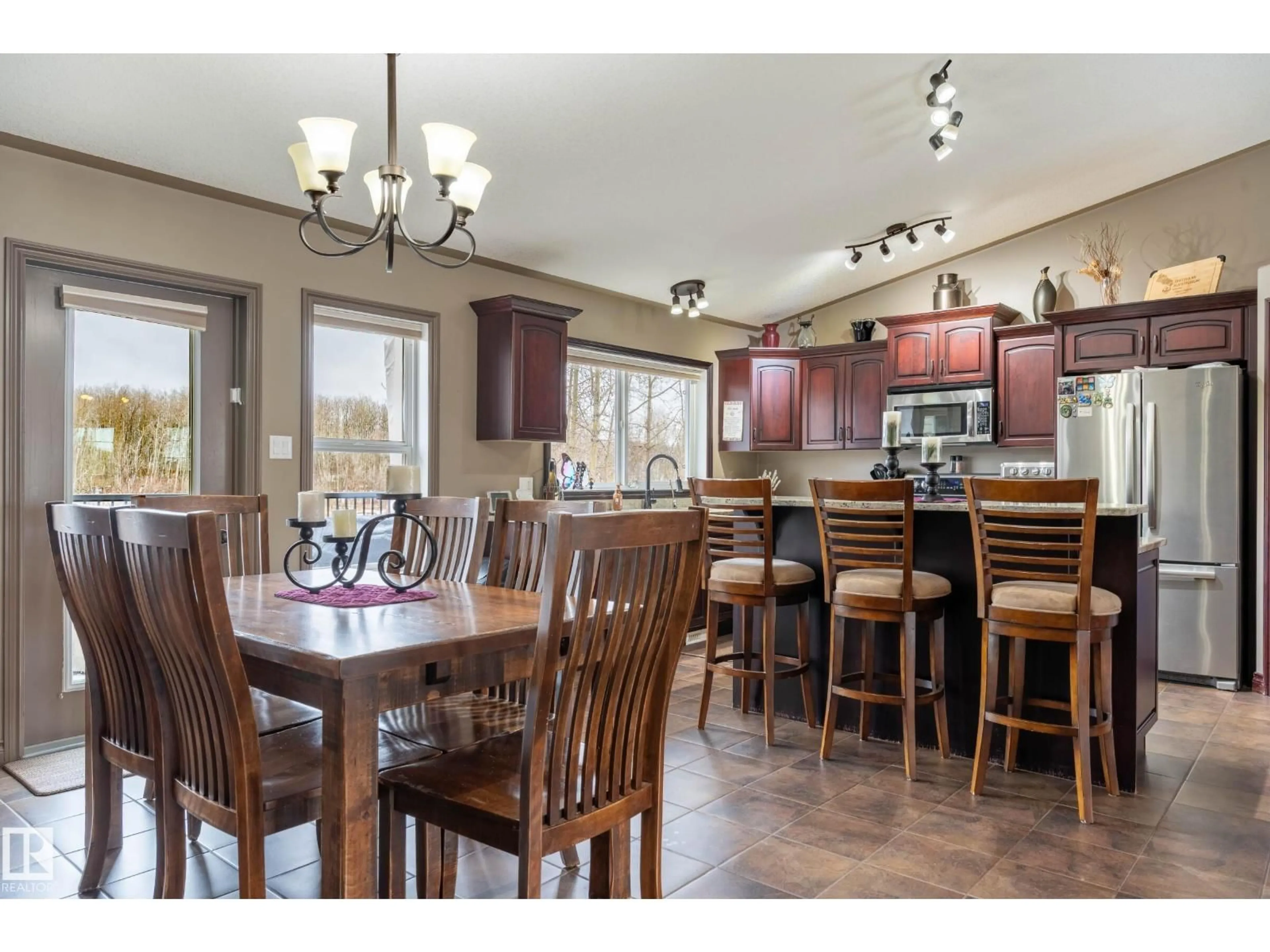 Open concept kitchen, wood/laminate floor for 61119 - 27 RGE RD 465, Rural Bonnyville M.D. Alberta T9N2G4