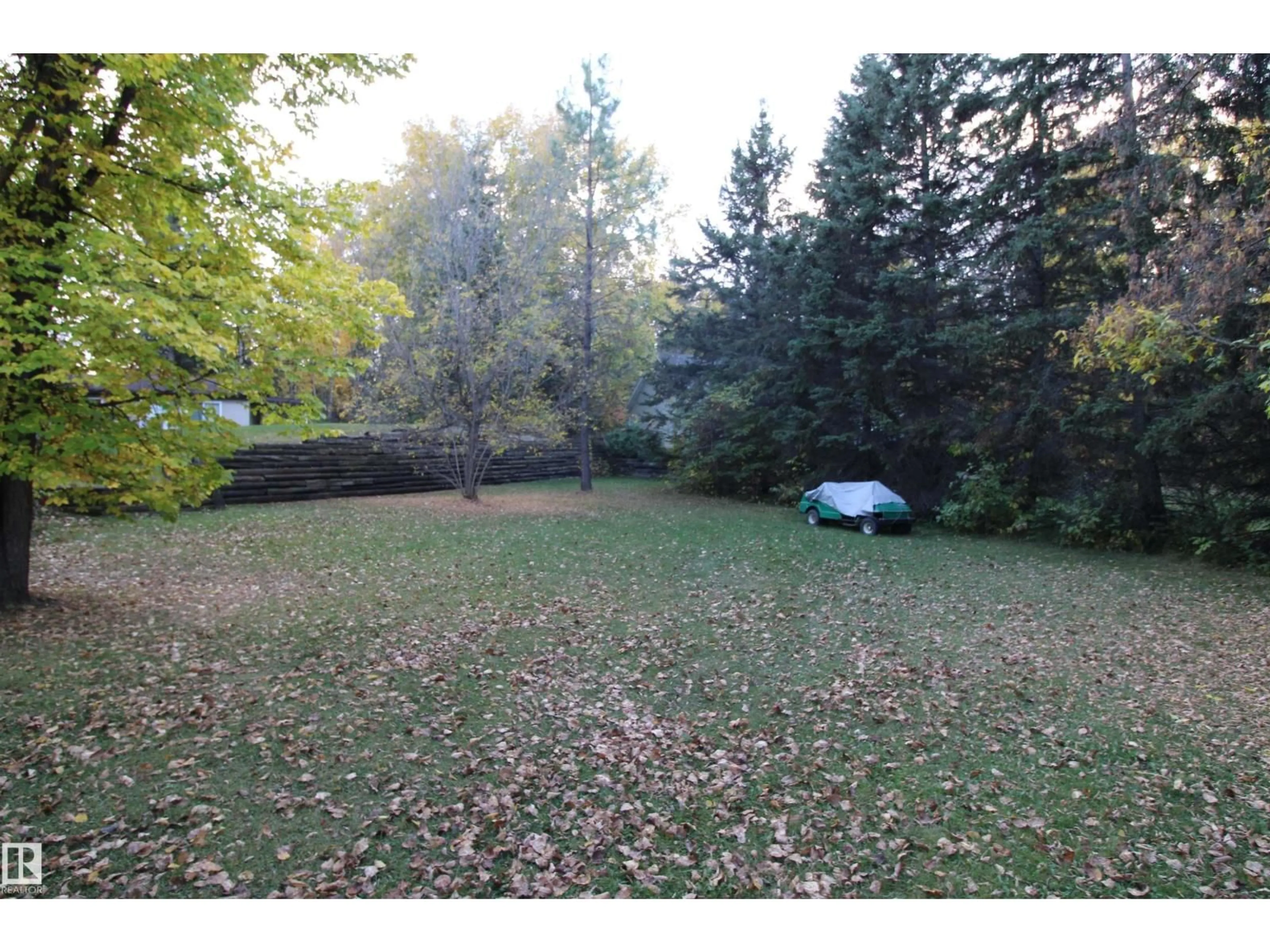 A pic from outside/outdoor area/front of a property/back of a property/a pic from drone, forest/trees view for 97 - 4418 HWY 633, Rural Lac Ste. Anne County Alberta T0E0L0