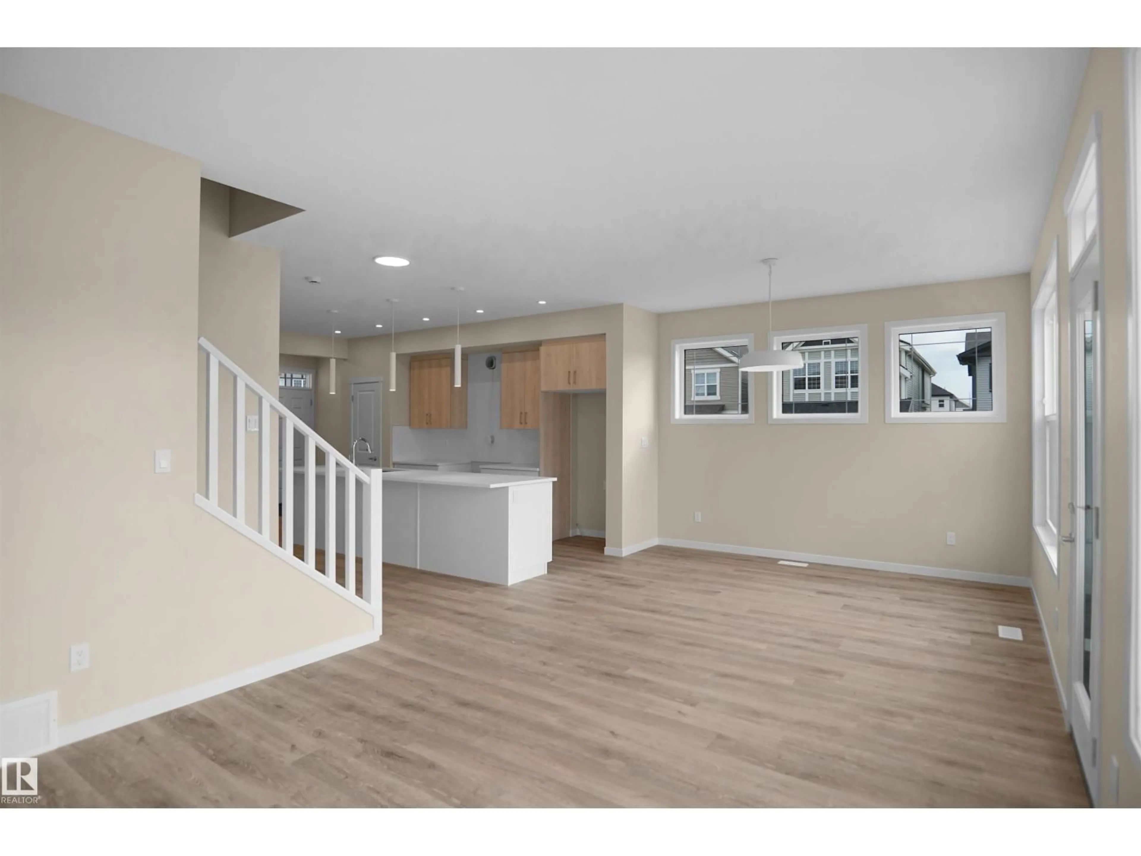 Open concept kitchen, wood/laminate floor for 22915 95 AV, Edmonton Alberta T5T7H6
