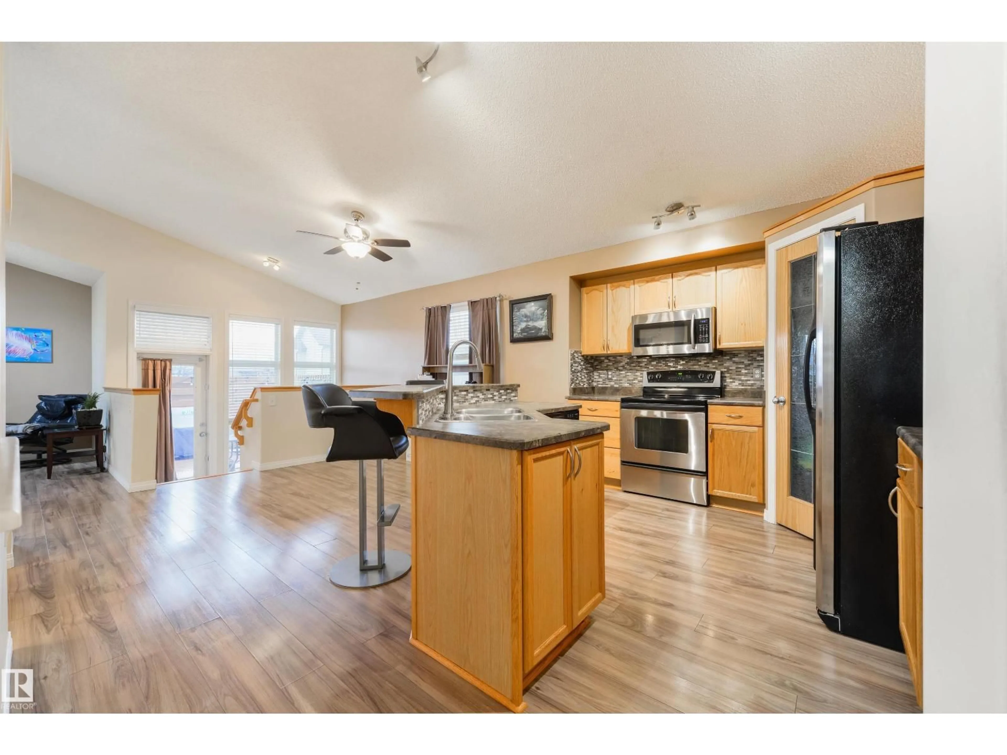 Open concept kitchen, wood/laminate floor for 7 HILLDOWNS DR, Spruce Grove Alberta T7X4P7