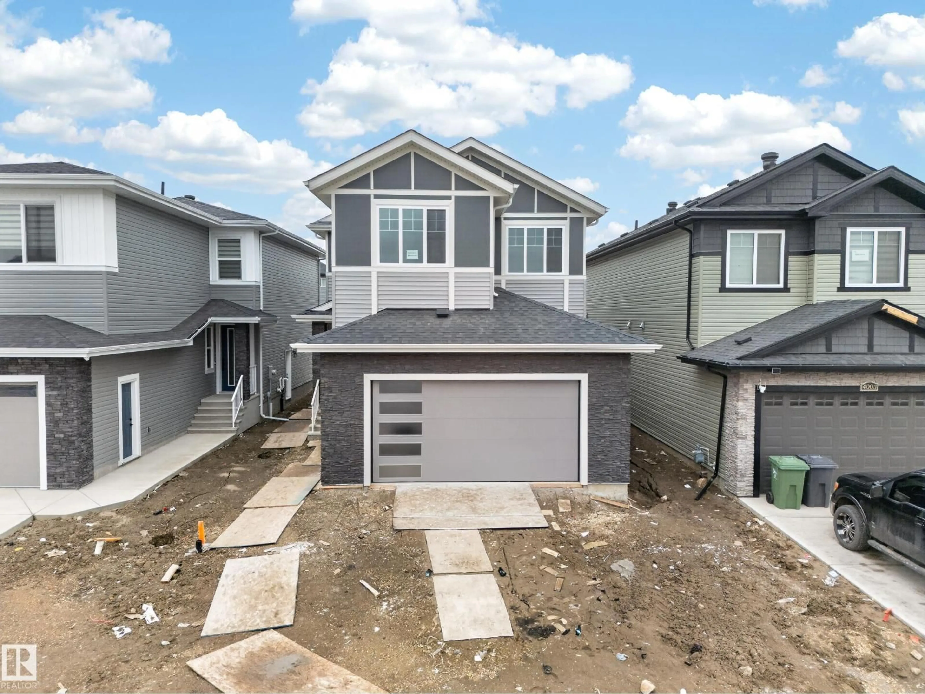 A pic from outside/outdoor area/front of a property/back of a property/a pic from drone, street for 4005 39 ST, Beaumont Alberta T6X3B5