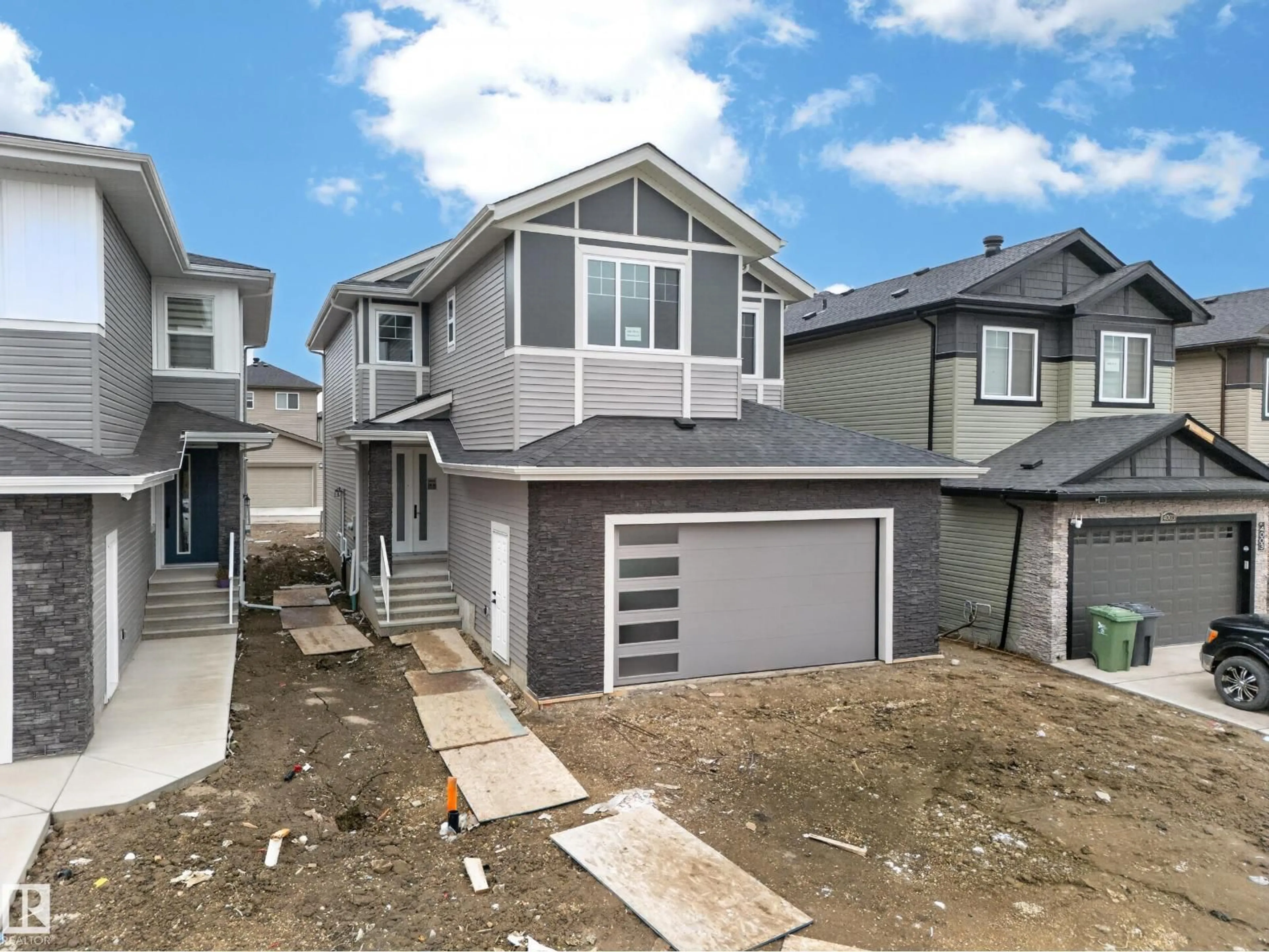 Home with vinyl exterior material, street for 4005 39 ST, Beaumont Alberta T6X3B5