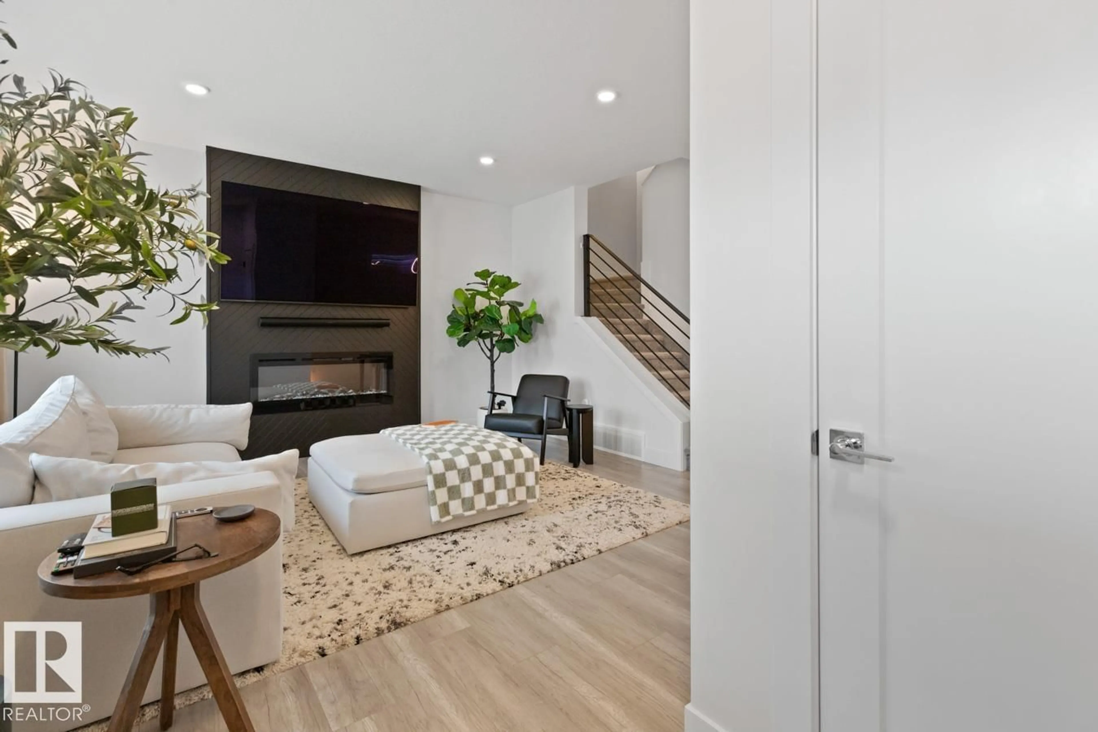 Living room with furniture, unknown for NW - 6023 180 AV, Edmonton Alberta T5Y3W9