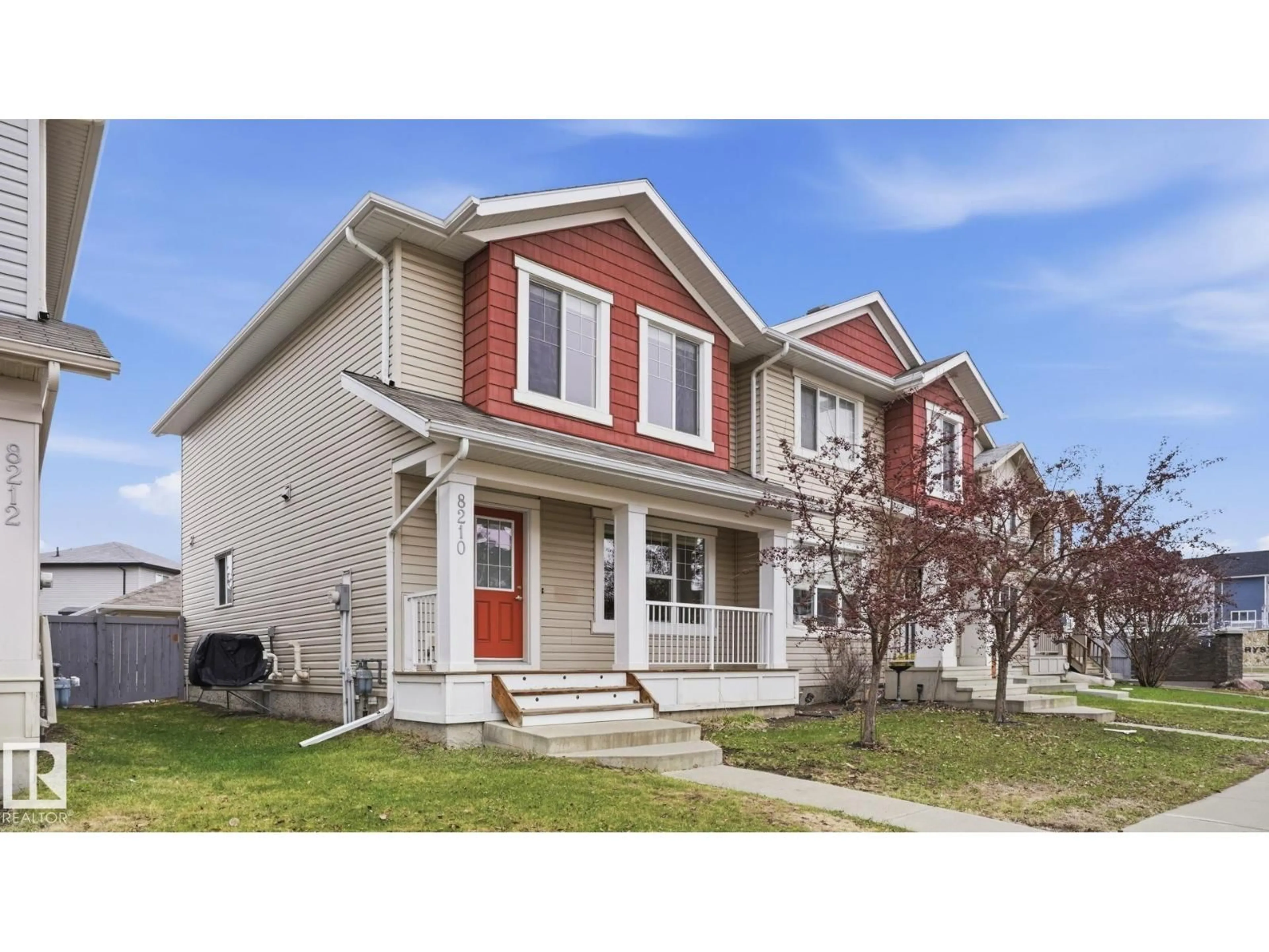 Home with vinyl exterior material, street for 8210 180 AV, Edmonton Alberta T5Z0H8