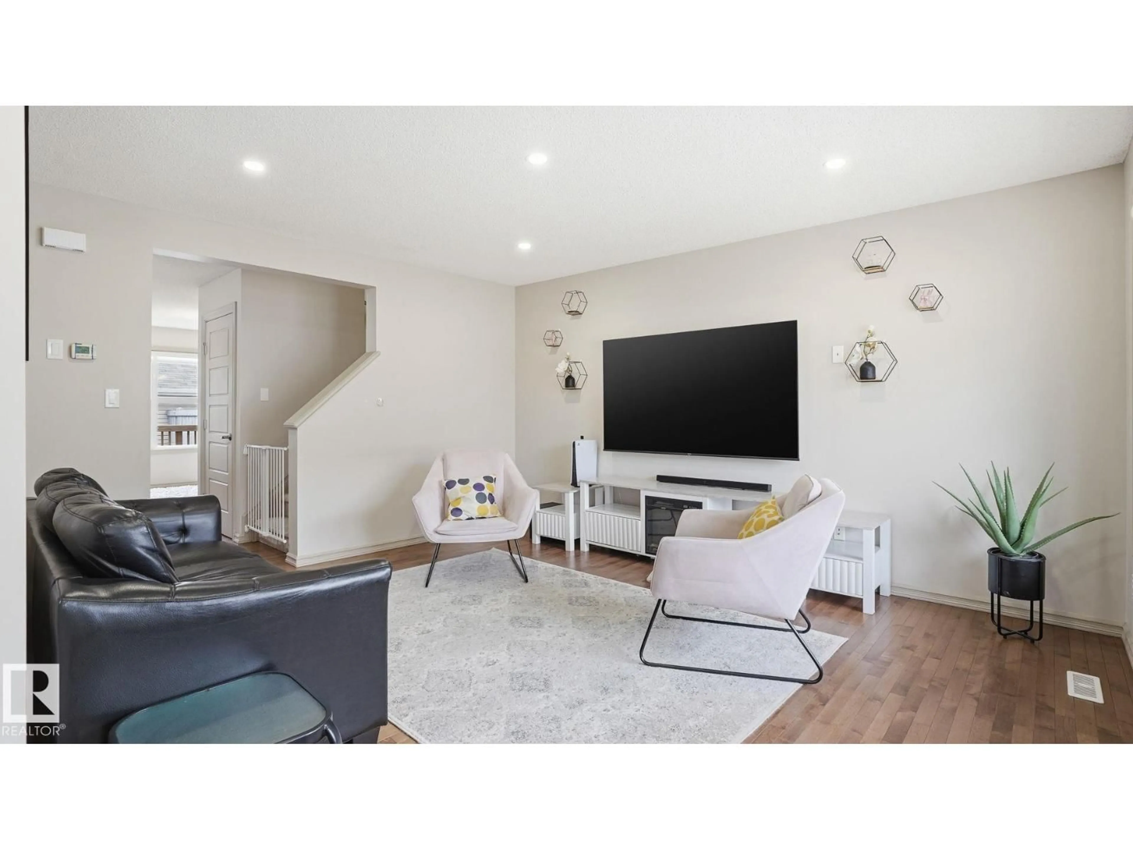 Living room with furniture, unknown for 8210 180 AV, Edmonton Alberta T5Z0H8