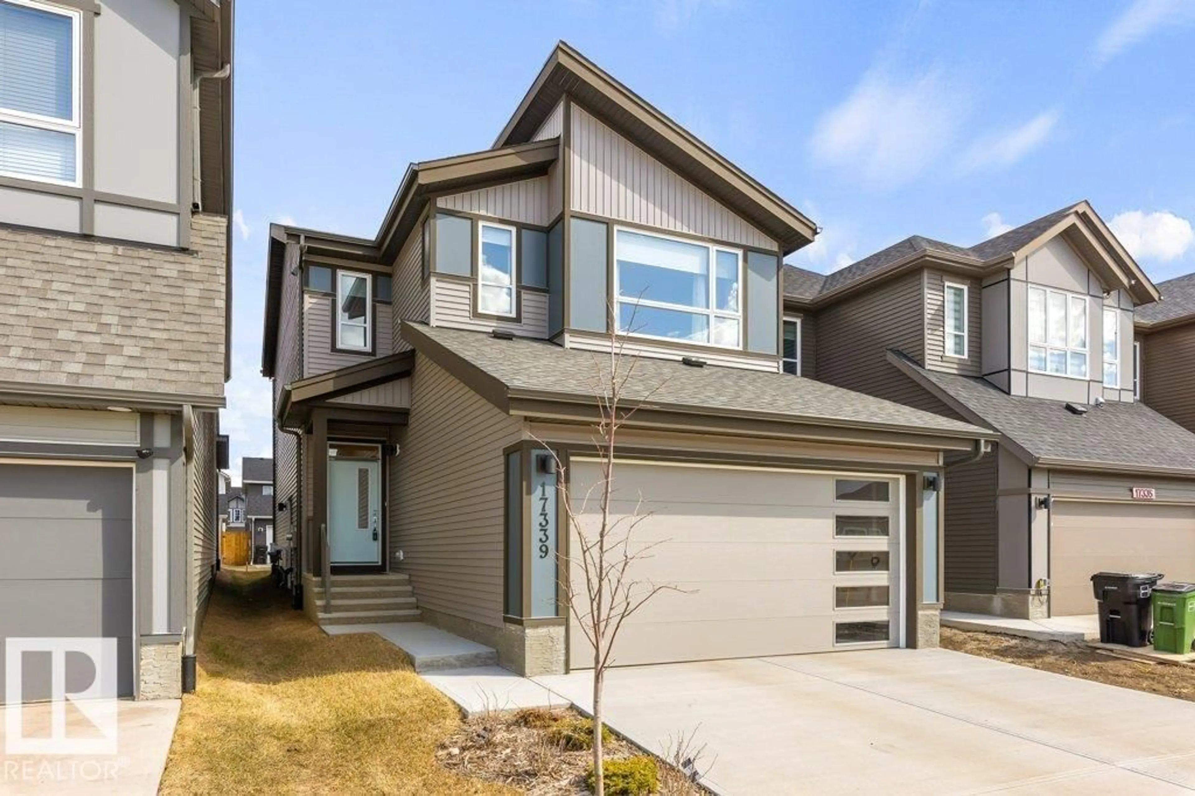 Home with vinyl exterior material, street for 17339 3 ST, Edmonton Alberta T5Y4G7