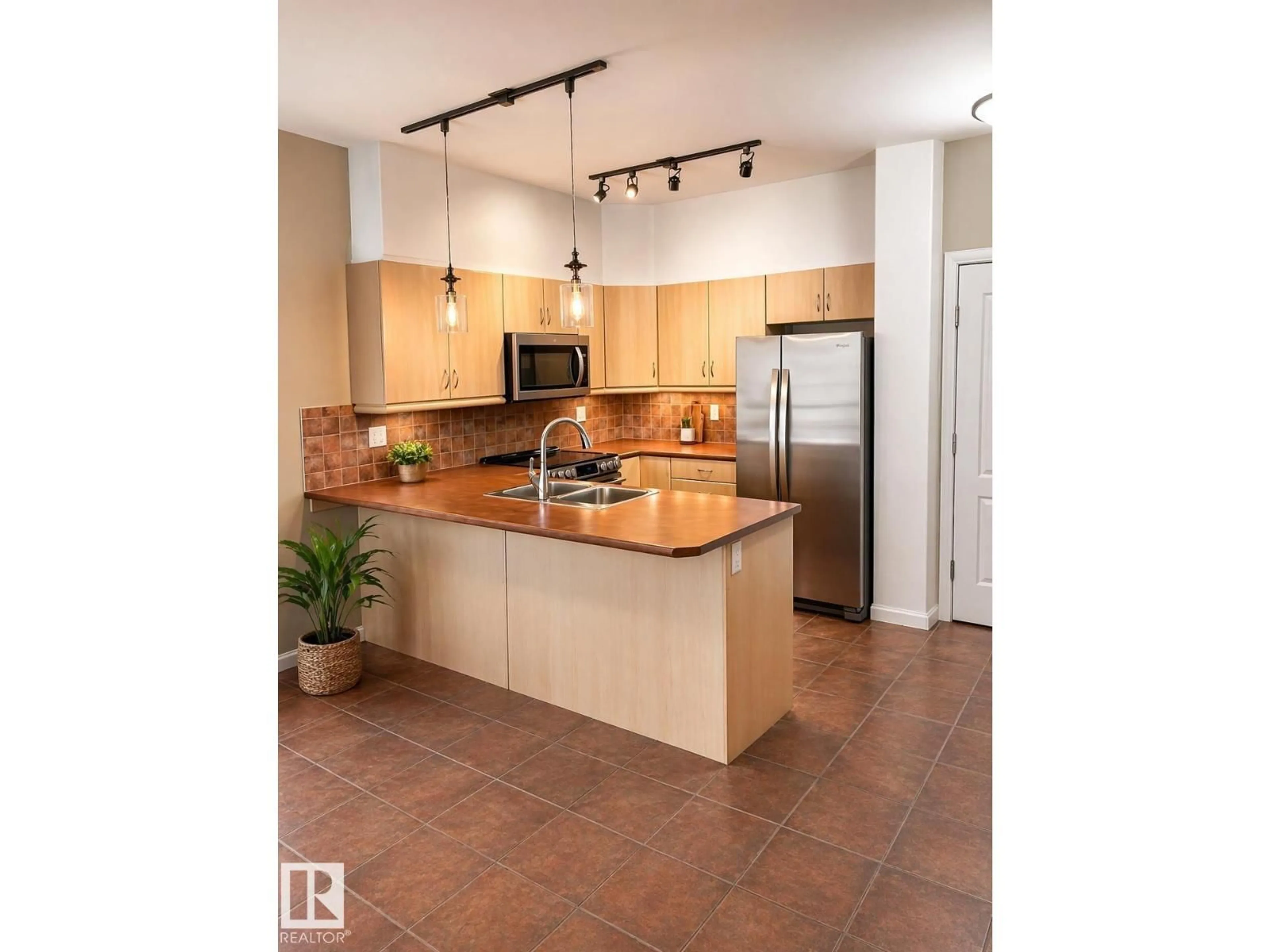 Open concept kitchen, unknown for #310 - 1406 HODGSON WY, Edmonton Alberta T6R3K1