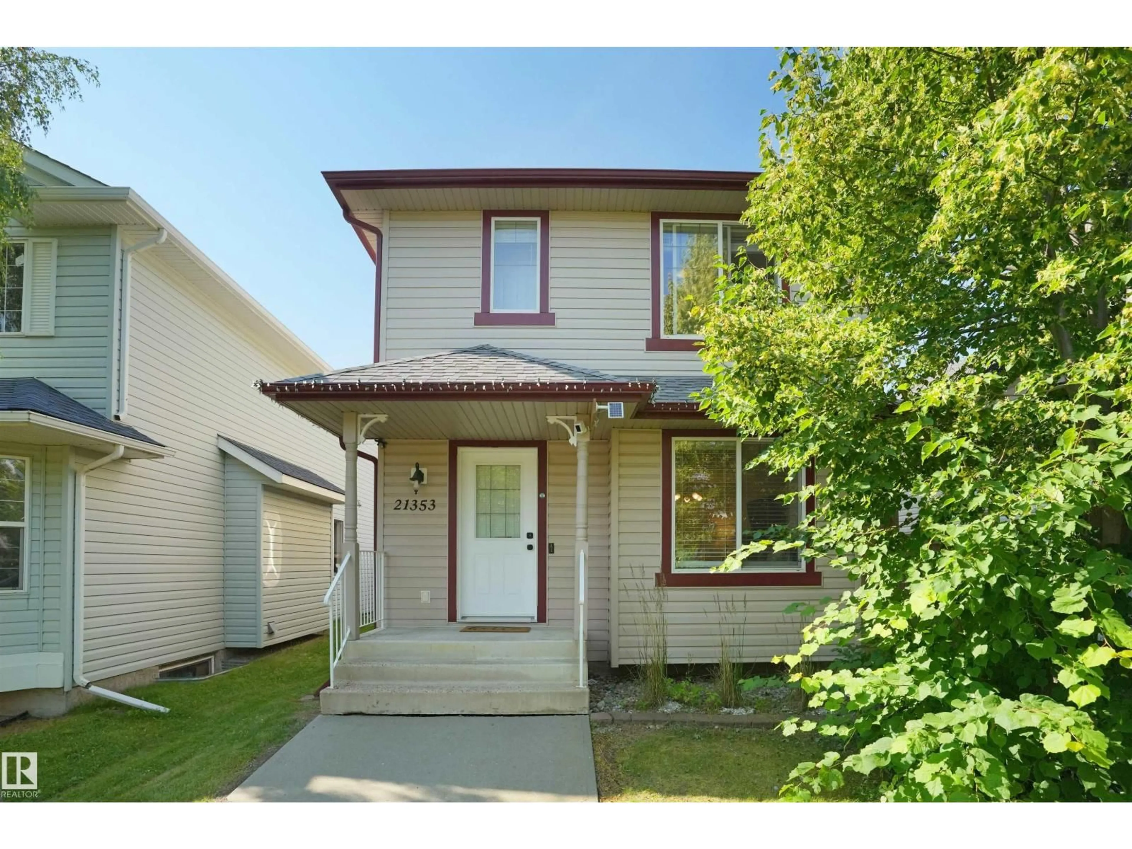 Home with vinyl exterior material, street for 21353 87A AV, Edmonton Alberta T5T6T7