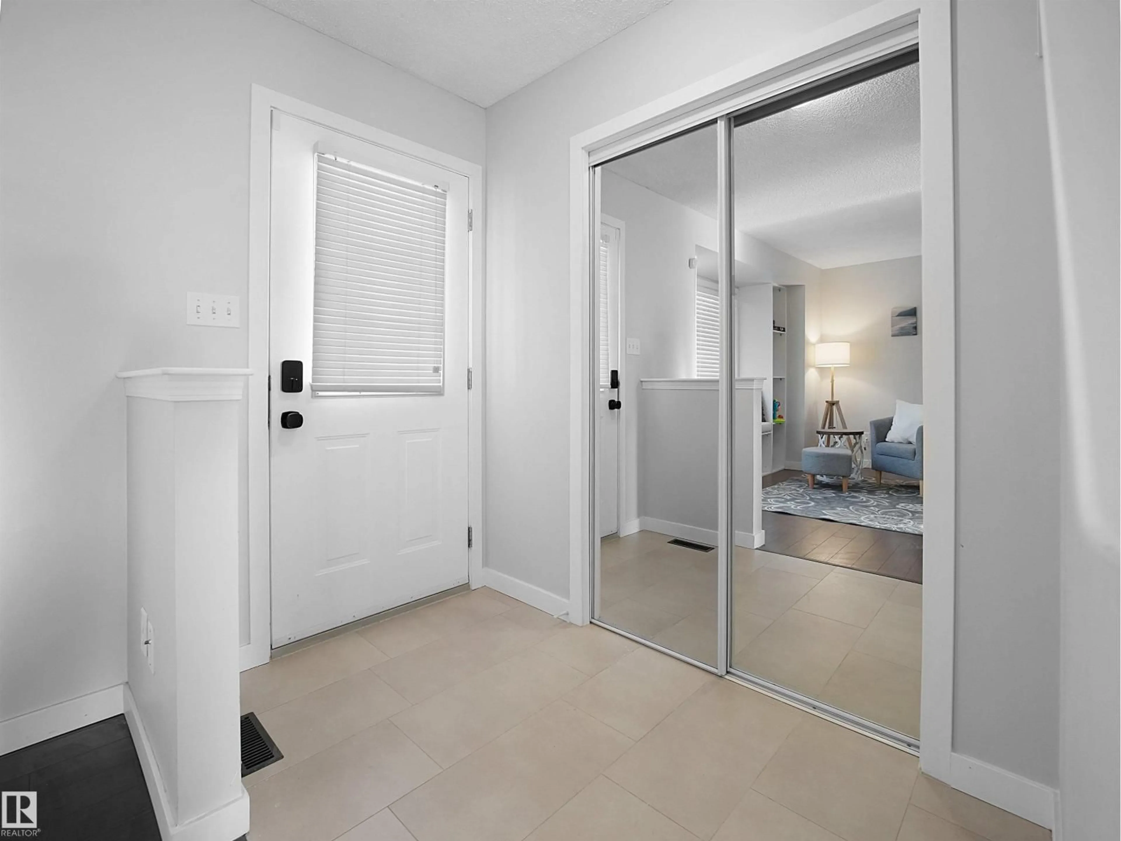 Indoor entryway for 21353 87A AV, Edmonton Alberta T5T6T7