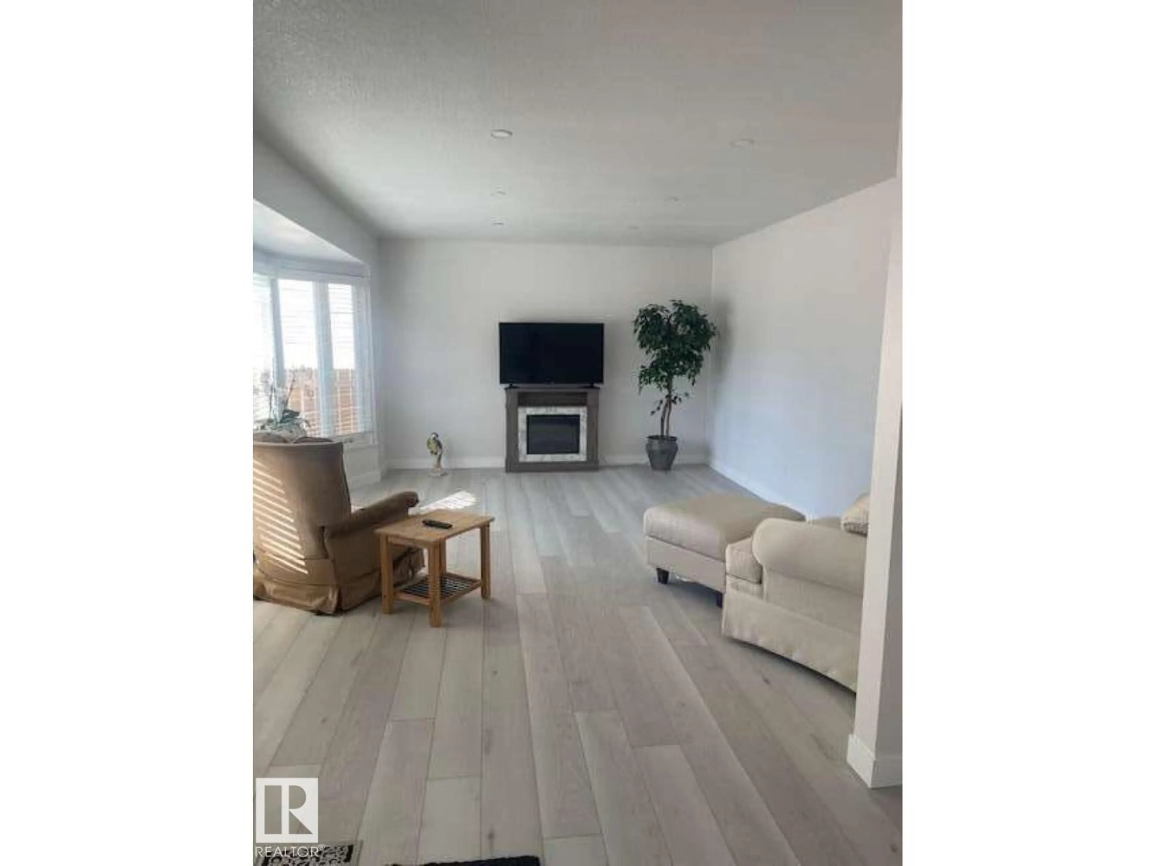 Living room with furniture, unknown for 1929 65 ST, Edmonton Alberta T6L1M1