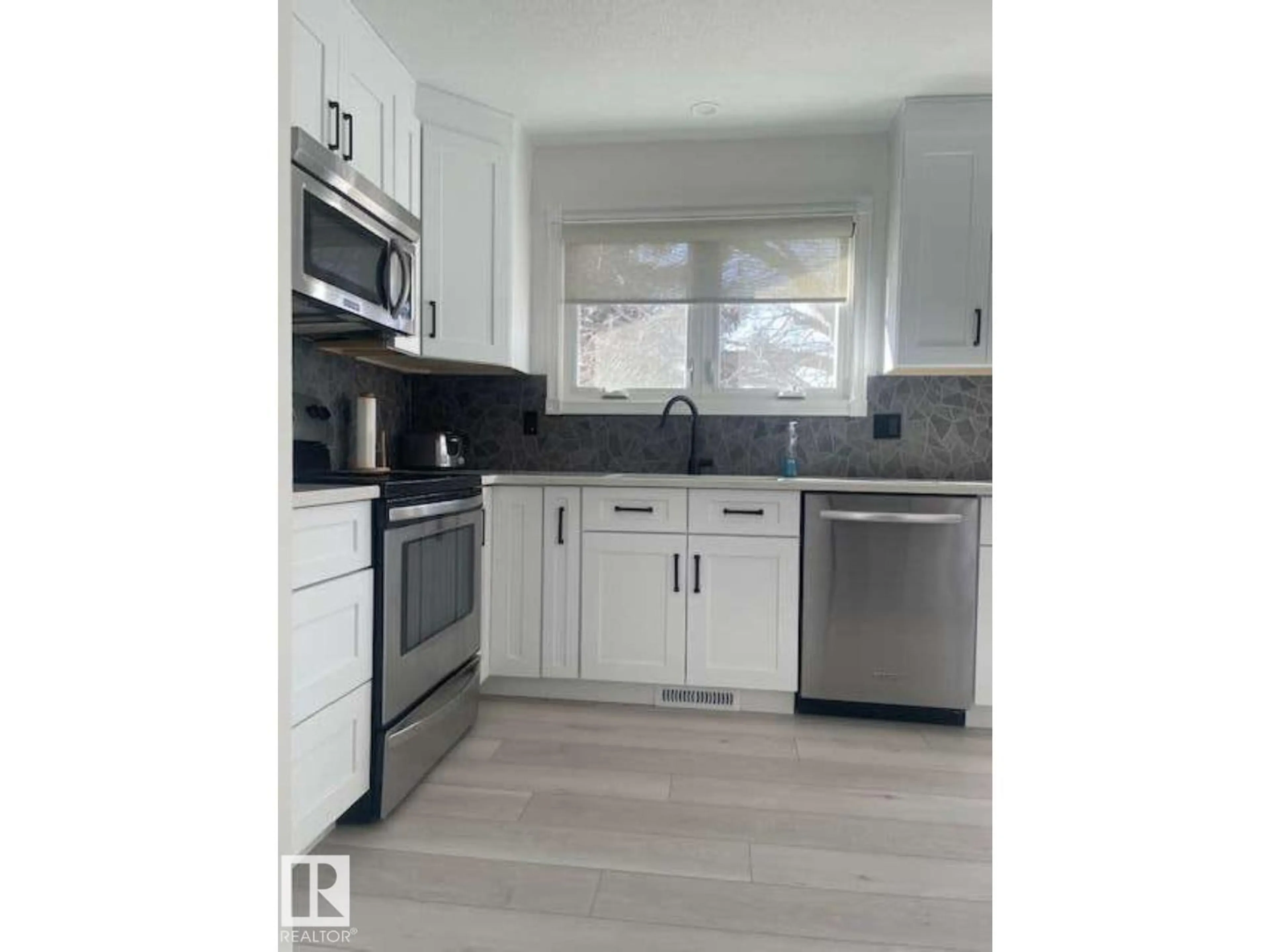 Standard kitchen, wood/laminate floor for 1929 65 ST, Edmonton Alberta T6L1M1