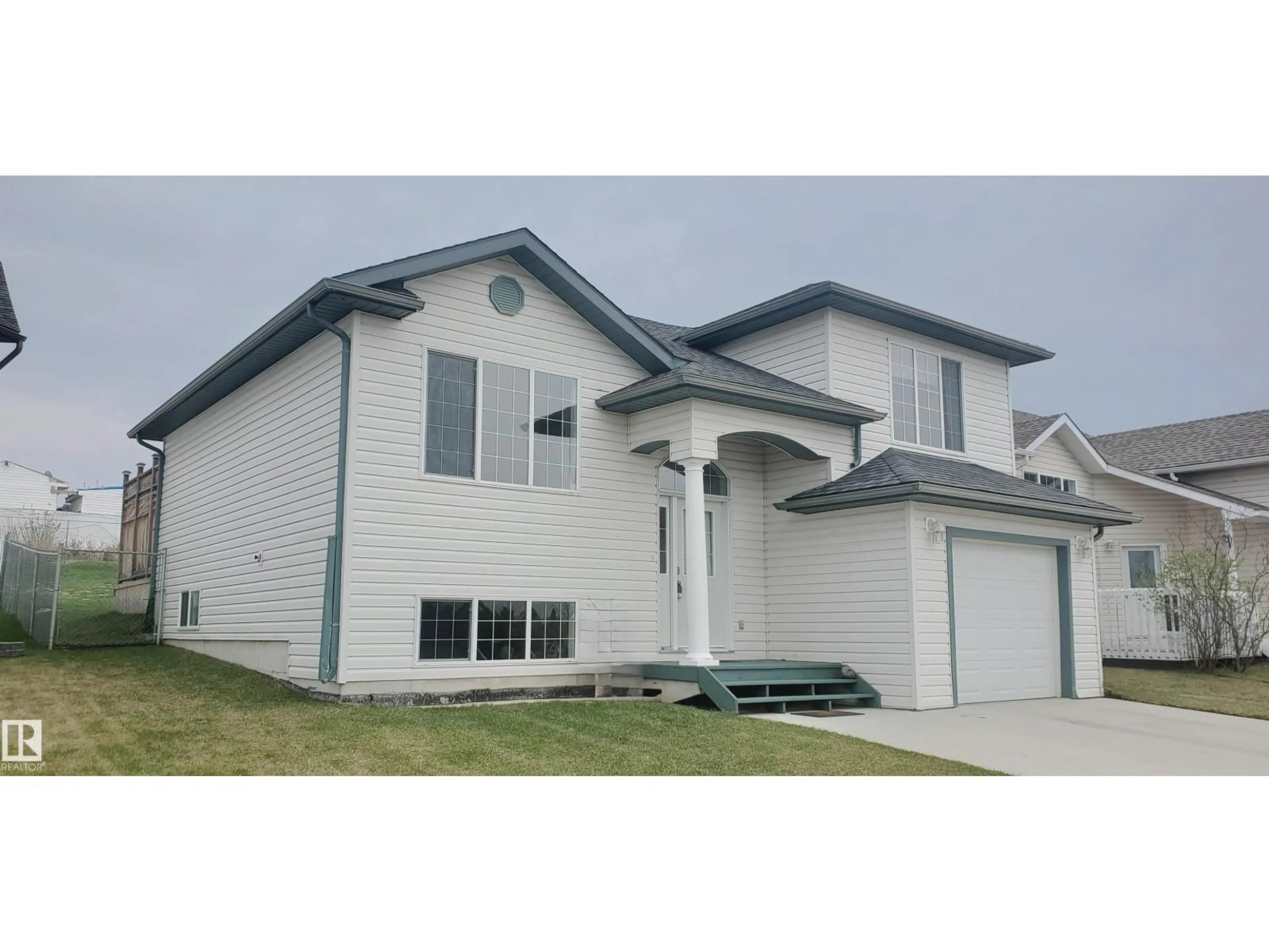 Home with vinyl exterior material, street for 4805 45 ST, Cold Lake Alberta T9M1N7