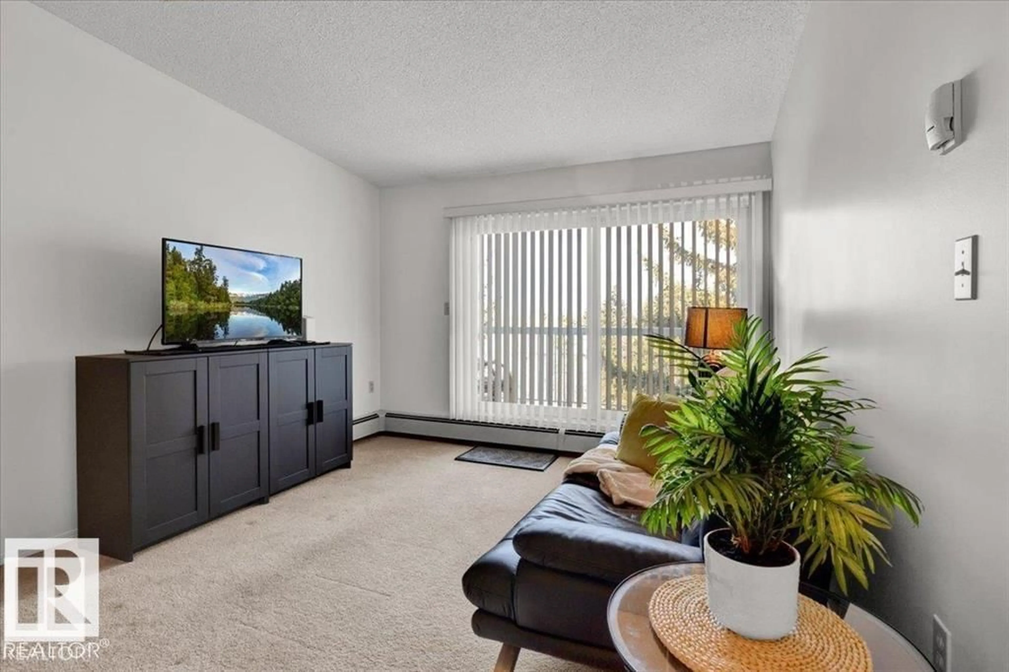 Living room with furniture, unknown for 415 15503 106 ST NW, Edmonton Alberta T5X5W7