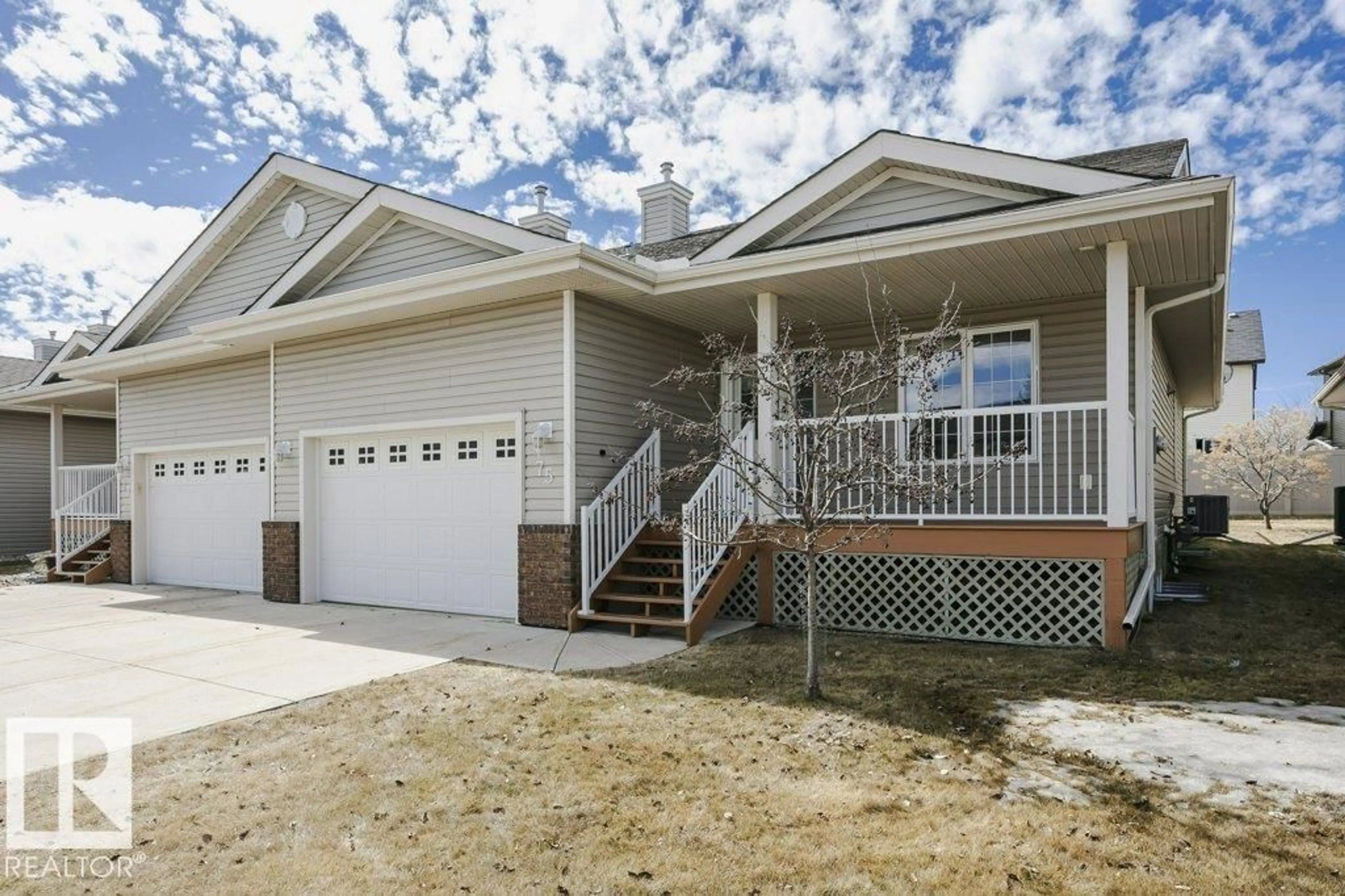 Home with vinyl exterior material, street for 8602 - 75 SOUTHFORT DR, Fort Saskatchewan Alberta T8L4R7