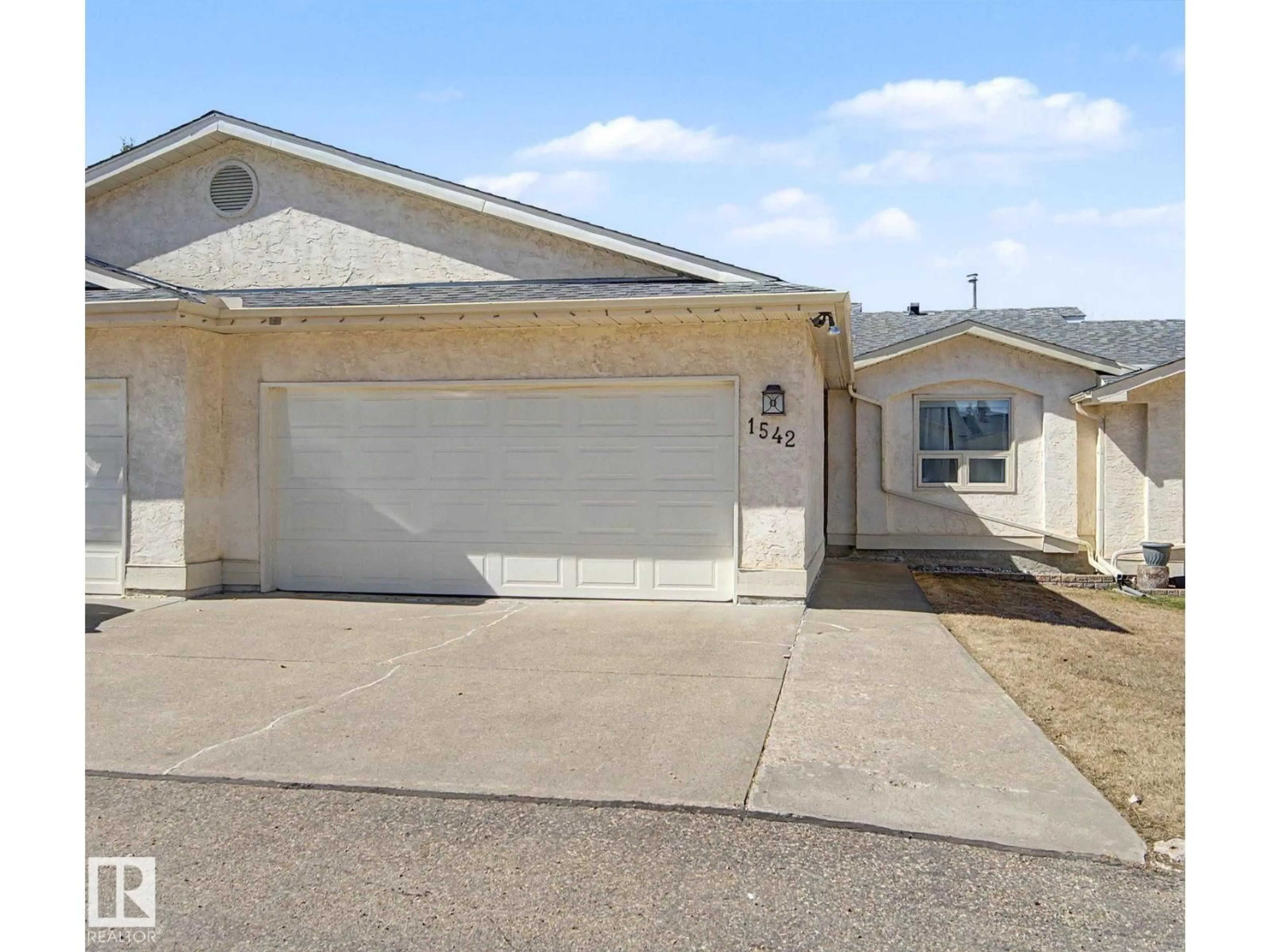 Home with vinyl exterior material, street for NW - 1542 54 ST, Edmonton Alberta T6L6H4