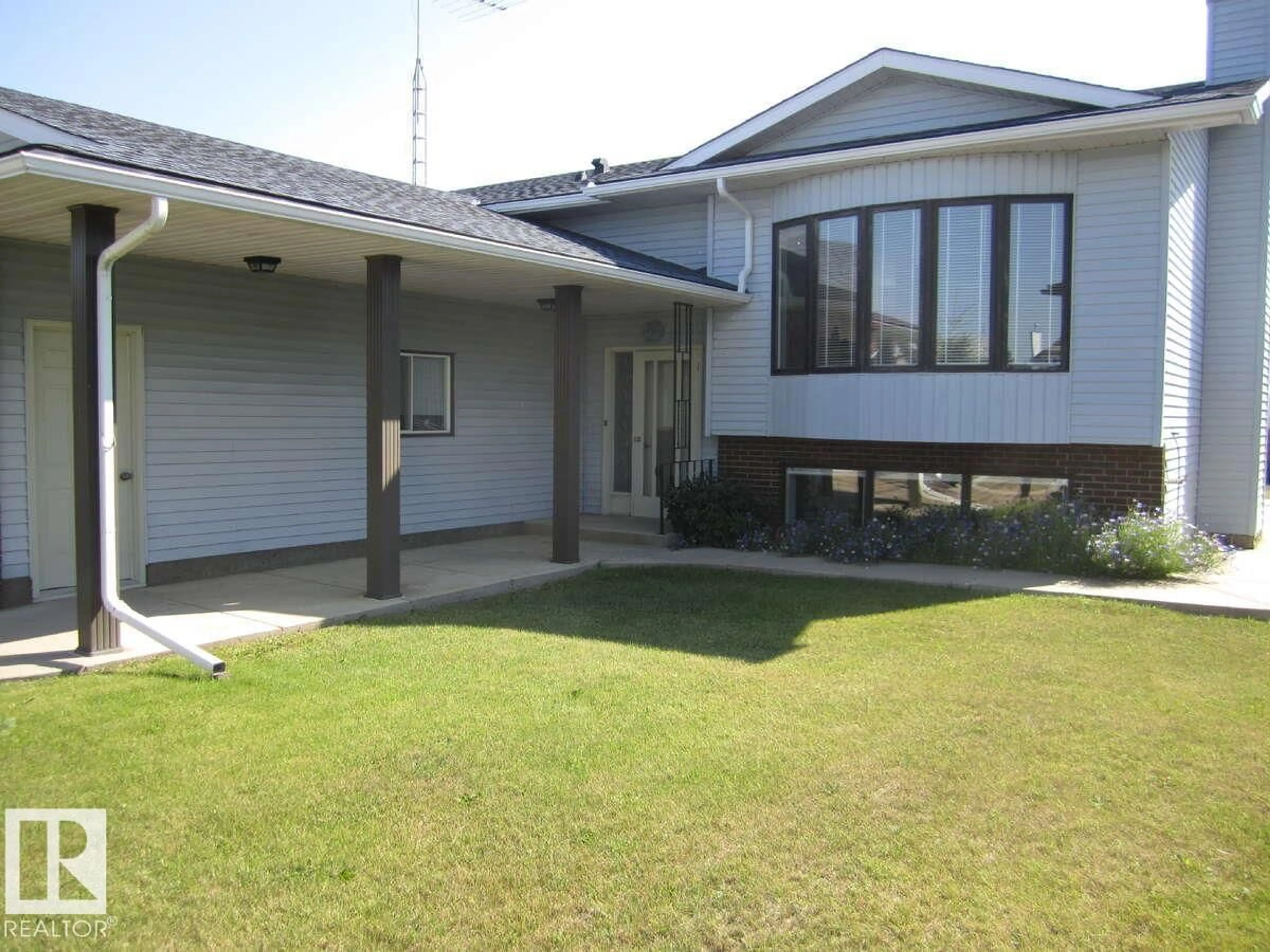 Home with vinyl exterior material, street for 4105 47 ST, Vegreville Alberta T9C1C1