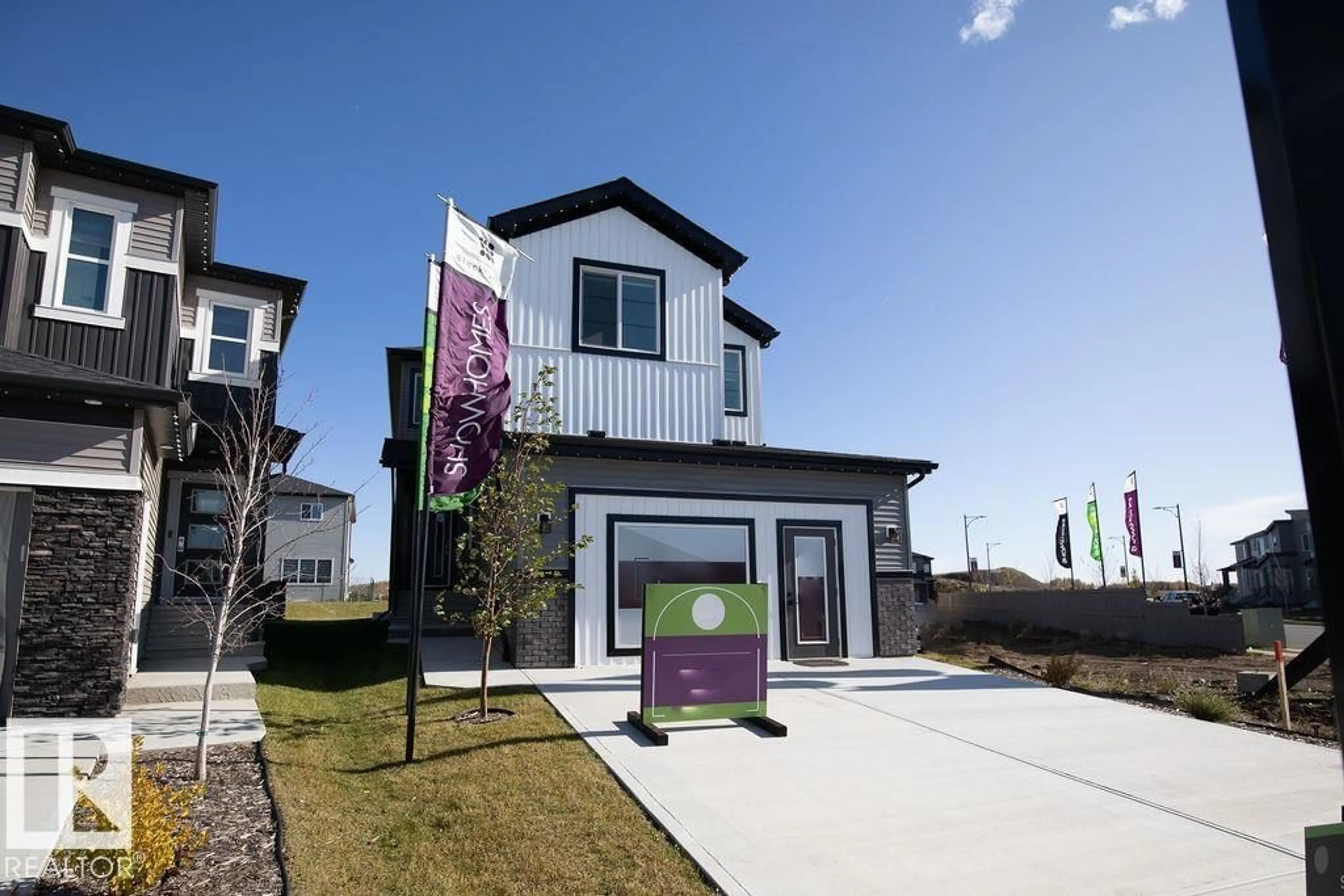 Home with vinyl exterior material, street for 102 BLUFF CV, Leduc Alberta T9E1M8