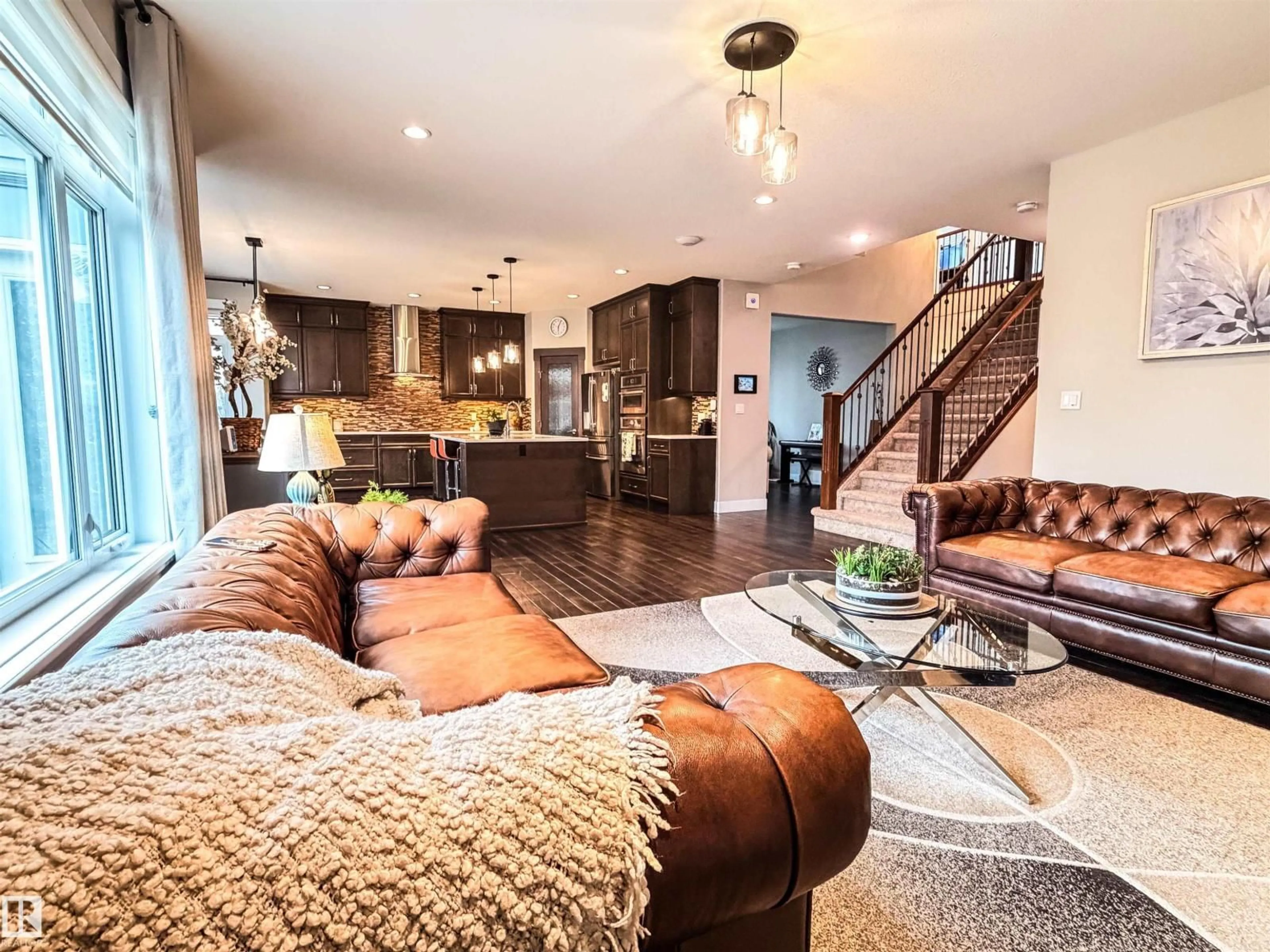 Living room with furniture, unknown for SW - 9004 24 AV, Edmonton Alberta T6X1A6