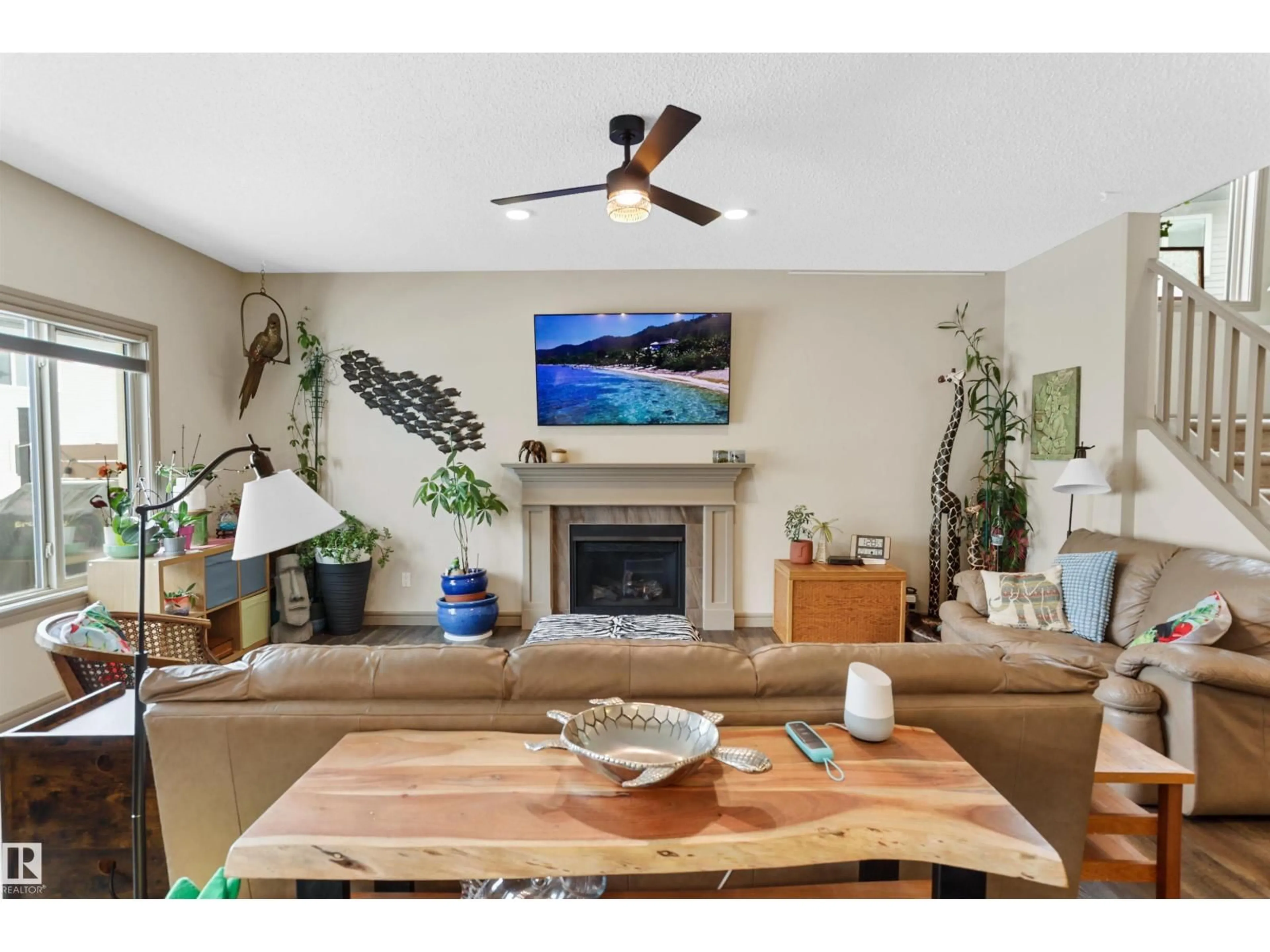 Living room with furniture, wood/laminate floor for 97 ASTORIA PT, Devon Alberta T9G0M3