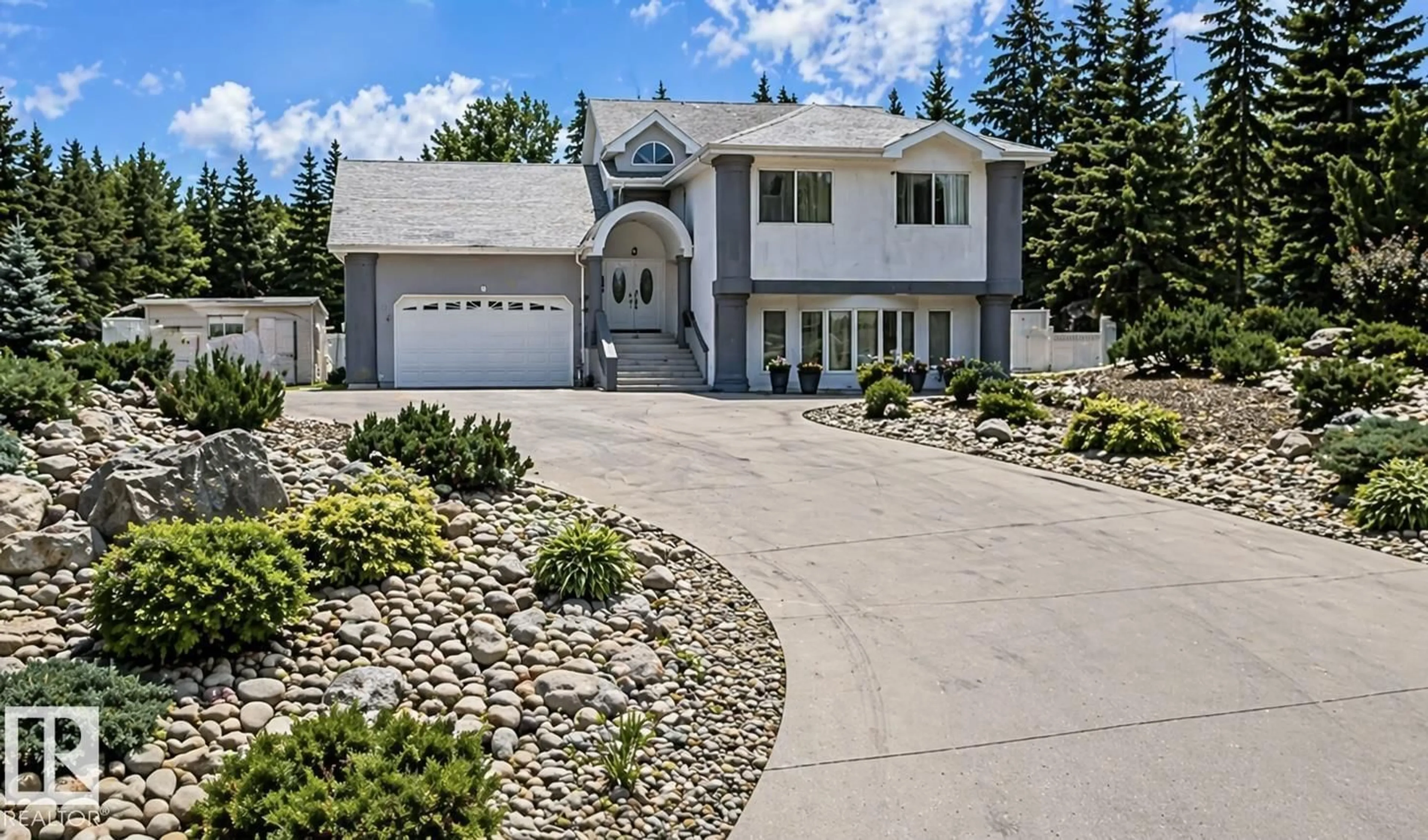 Home with vinyl exterior material, street for 18633 122 AV NW, Edmonton Alberta T5V1R4