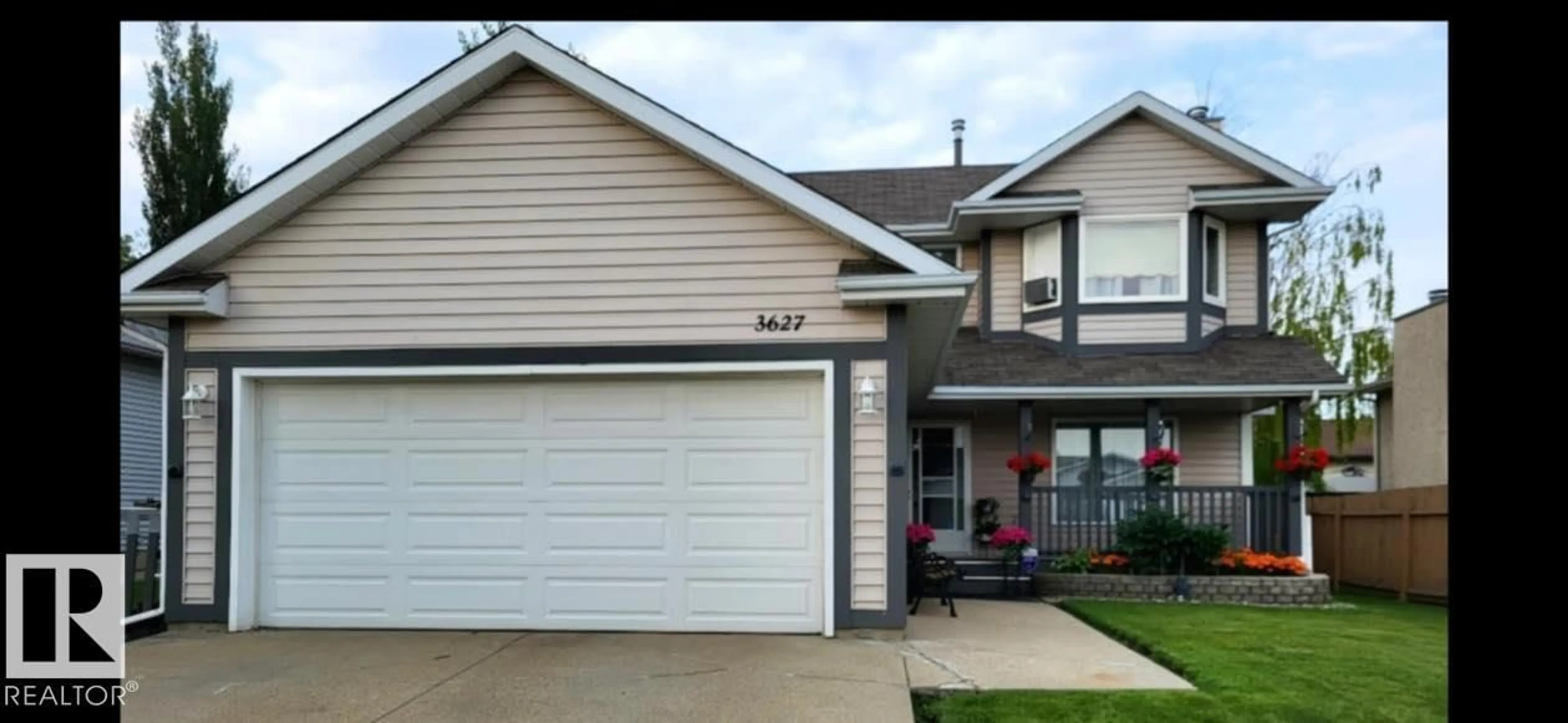 Home with vinyl exterior material, street for 3627 146 AV, Edmonton Alberta T5Y2J6