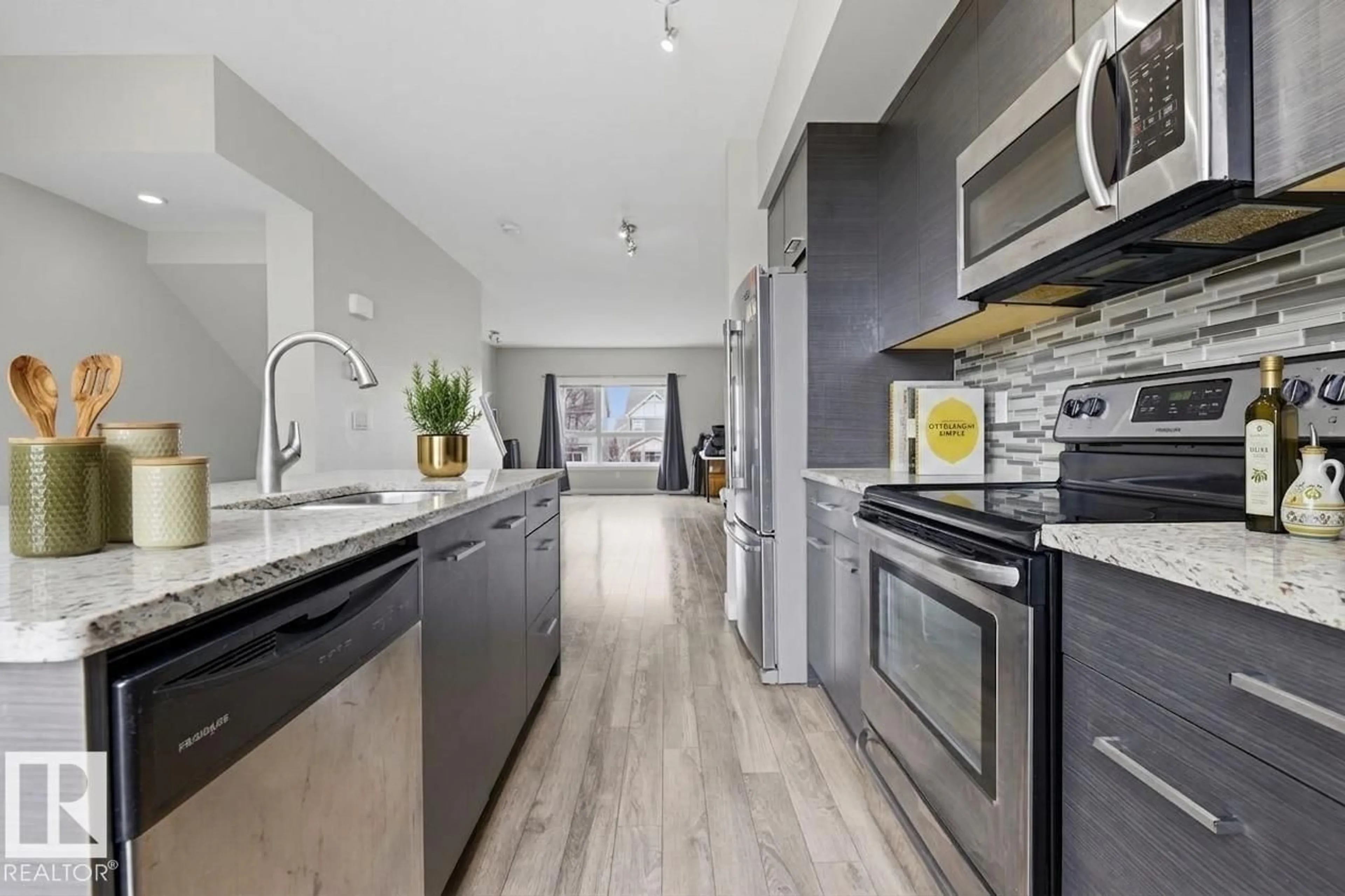 Open concept kitchen, ceramic/tile floor for 18 - 2560 PEGASUS BV, Edmonton Alberta T5E6V4