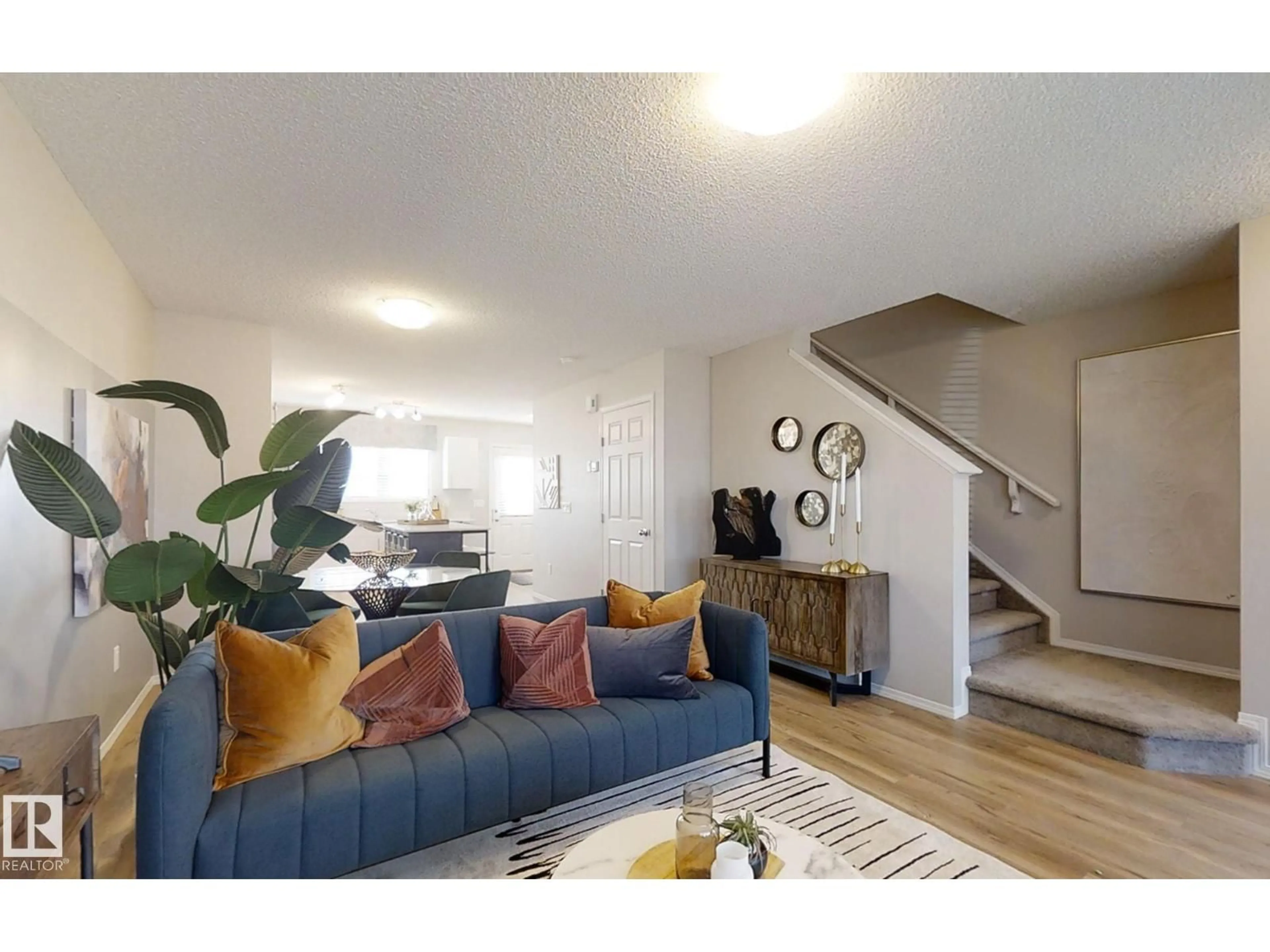 Living room with furniture, unknown for NW - 1609 210A ST, Edmonton Alberta T6M3E1