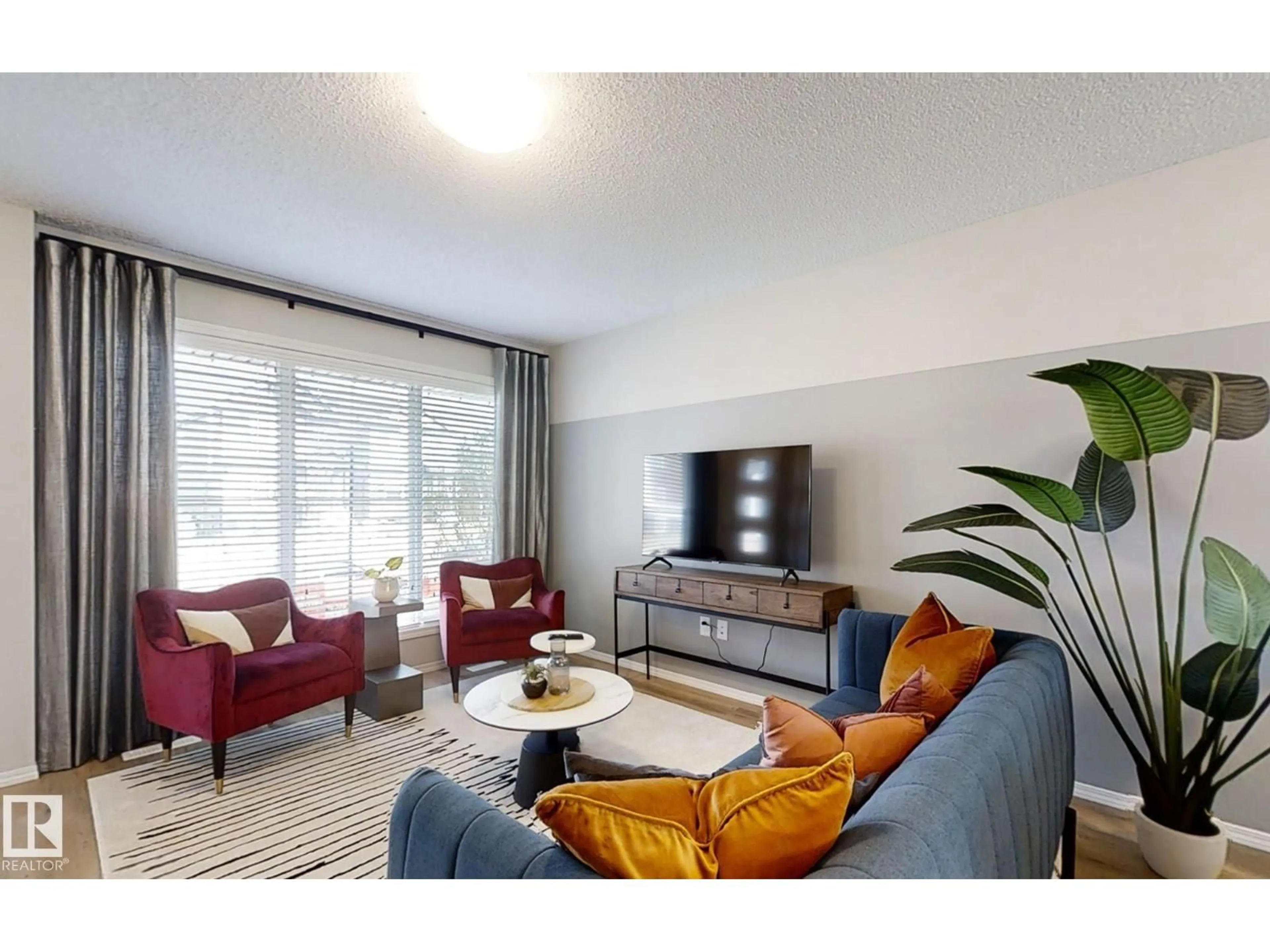 Living room with furniture, unknown for NW - 1609 210A ST, Edmonton Alberta T6M3E1