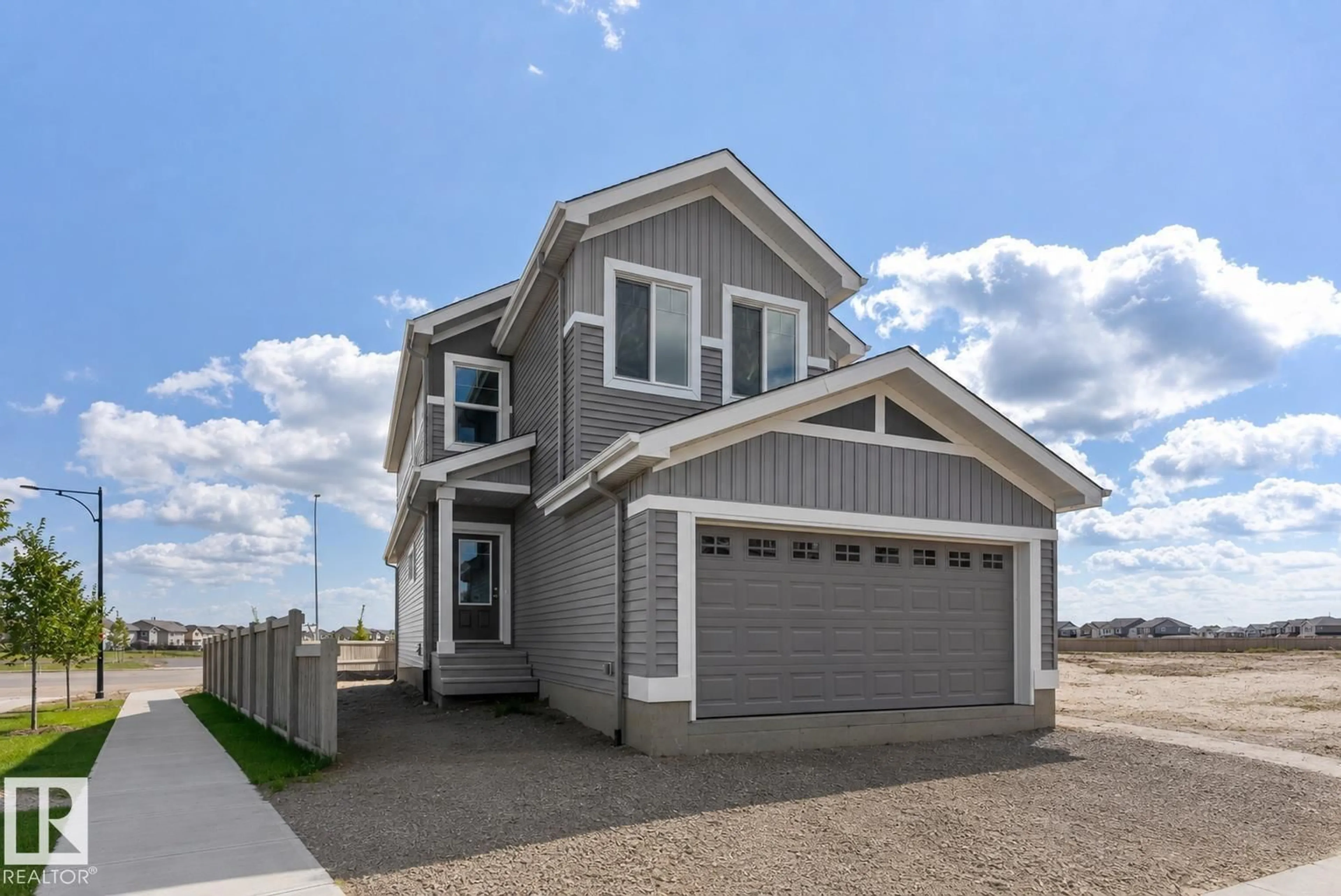 Home with vinyl exterior material, street for 20803 40 AV, Edmonton Alberta T6M3G1