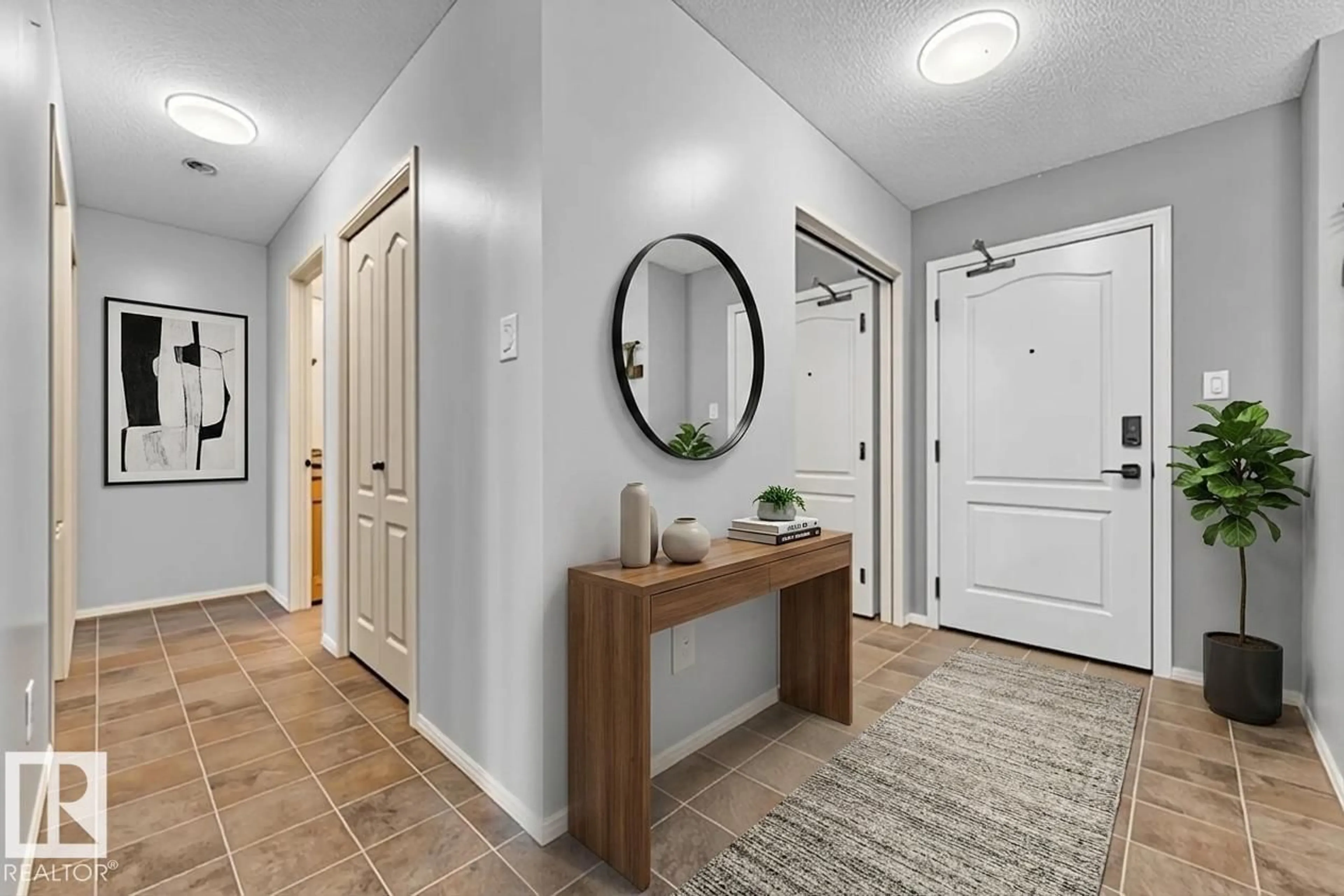 Indoor entryway for 113 - 5951 165 AV, Edmonton Alberta T5Y0J6