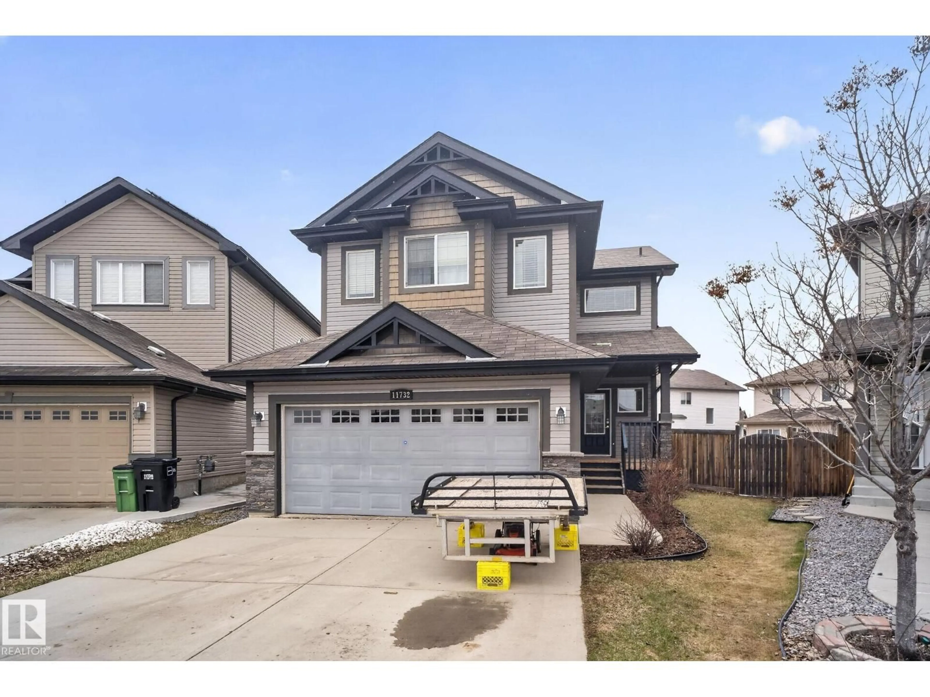 Home with vinyl exterior material, street for 11732 18 AV, Edmonton Alberta T6W2E7