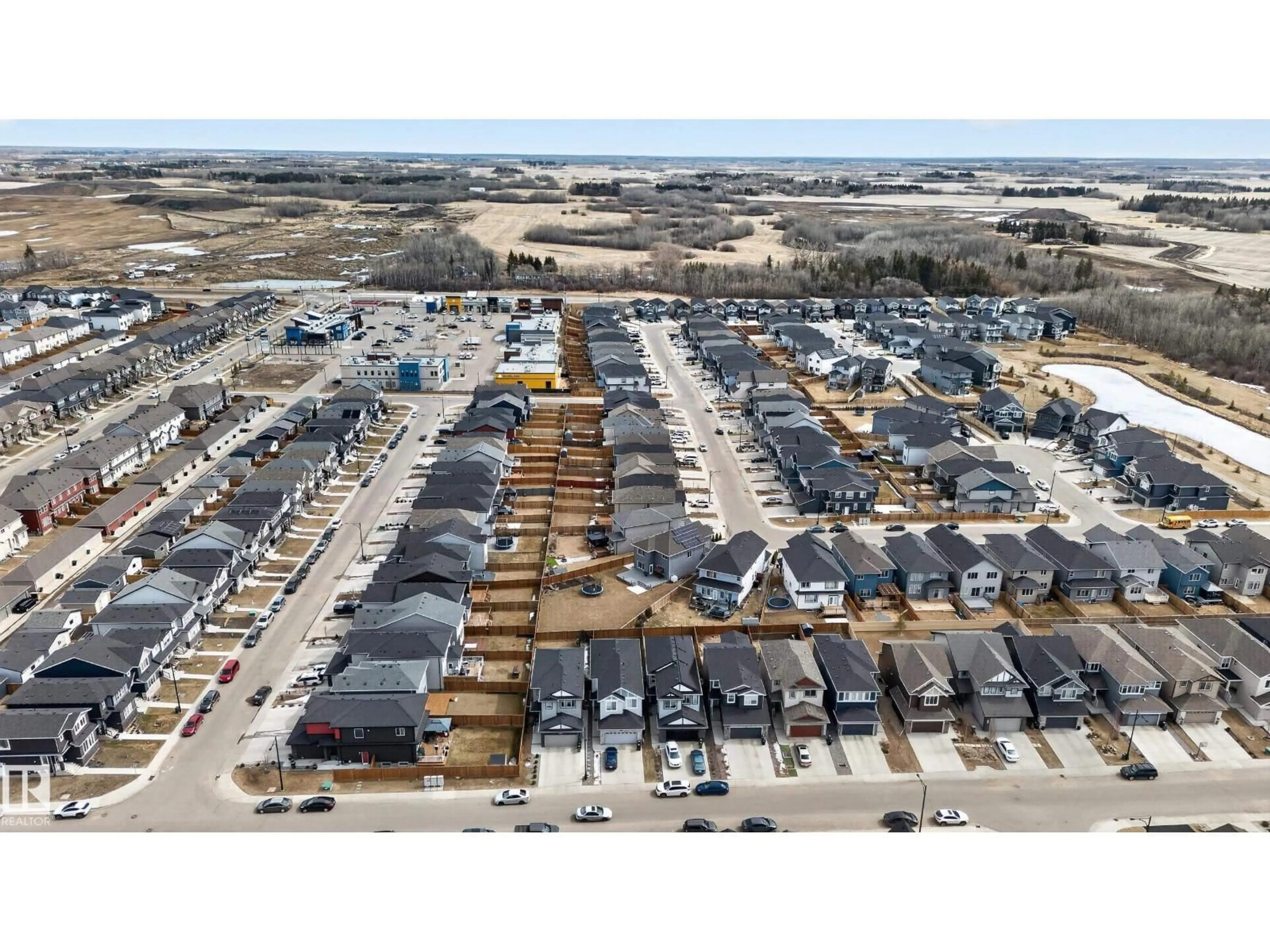 A pic from outside/outdoor area/front of a property/back of a property/a pic from drone, street for 5242 23 AV, Edmonton Alberta T6X2X3