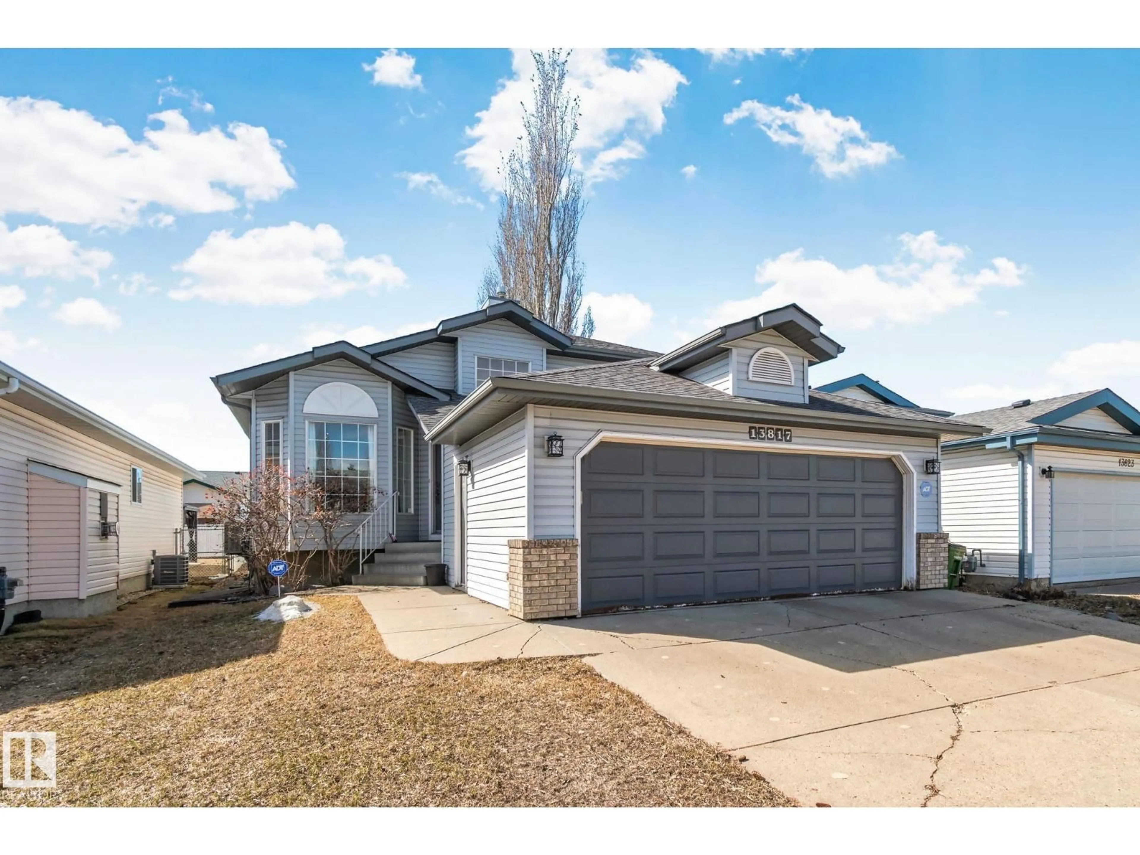 Home with vinyl exterior material, street for 13817 131A AV, Edmonton Alberta T5L5A7