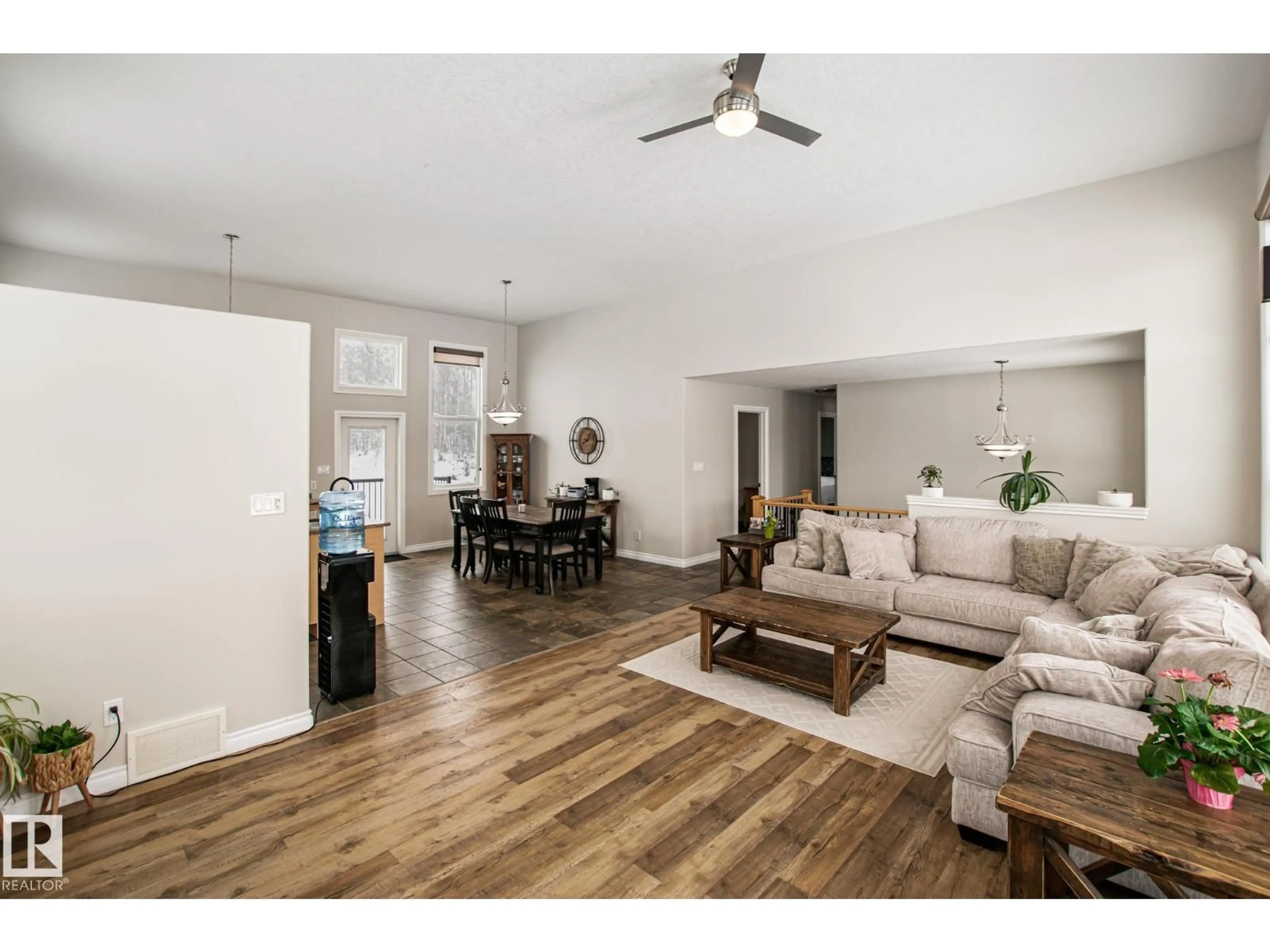 Living room with furniture, wood/laminate floor for 61119 - 24 RGE RD 465, Rural Bonnyville M.D. Alberta T9N2J6