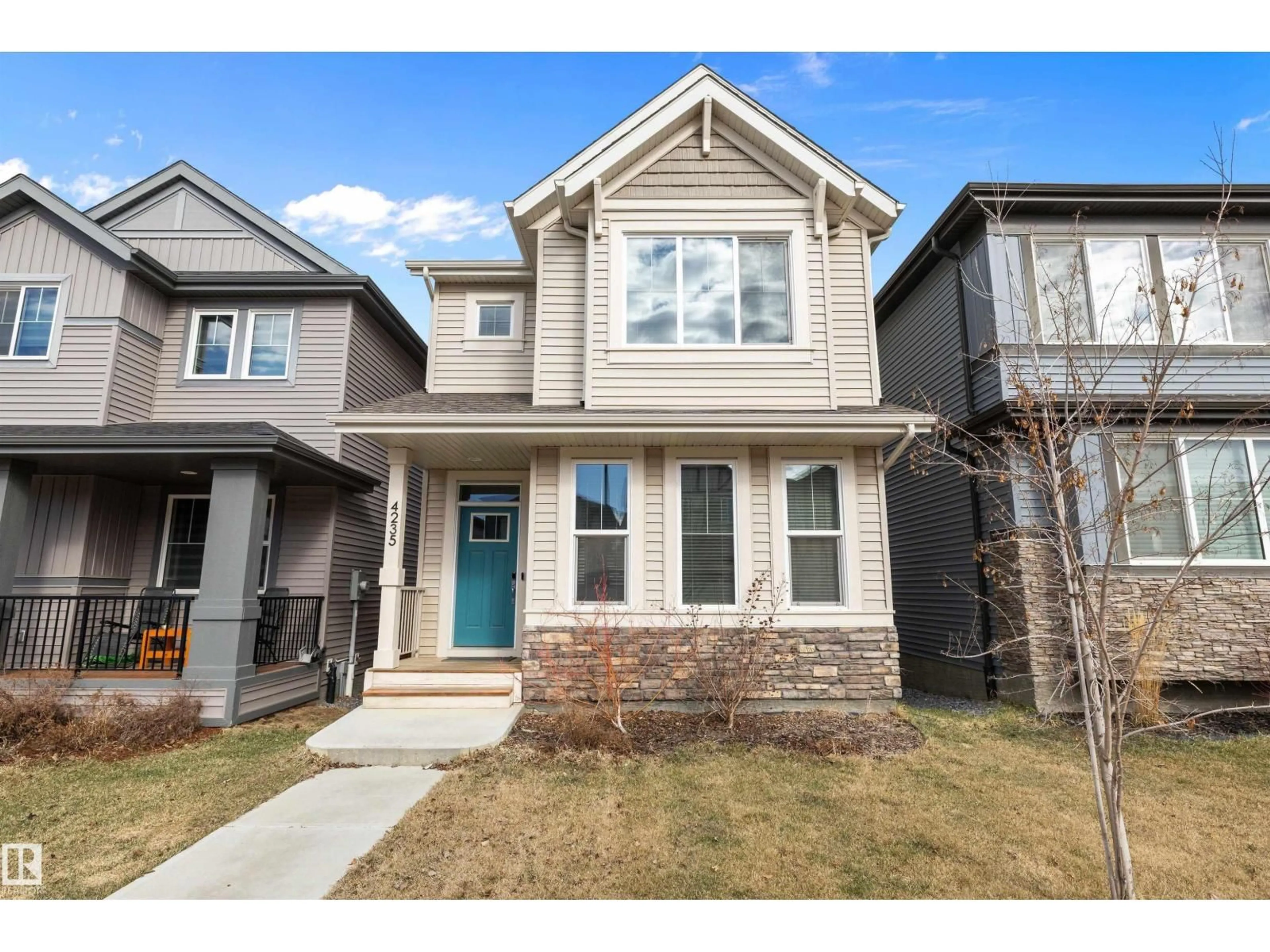 Home with vinyl exterior material, street for 4235 CHICHAK CL, Edmonton Alberta T6W4B3