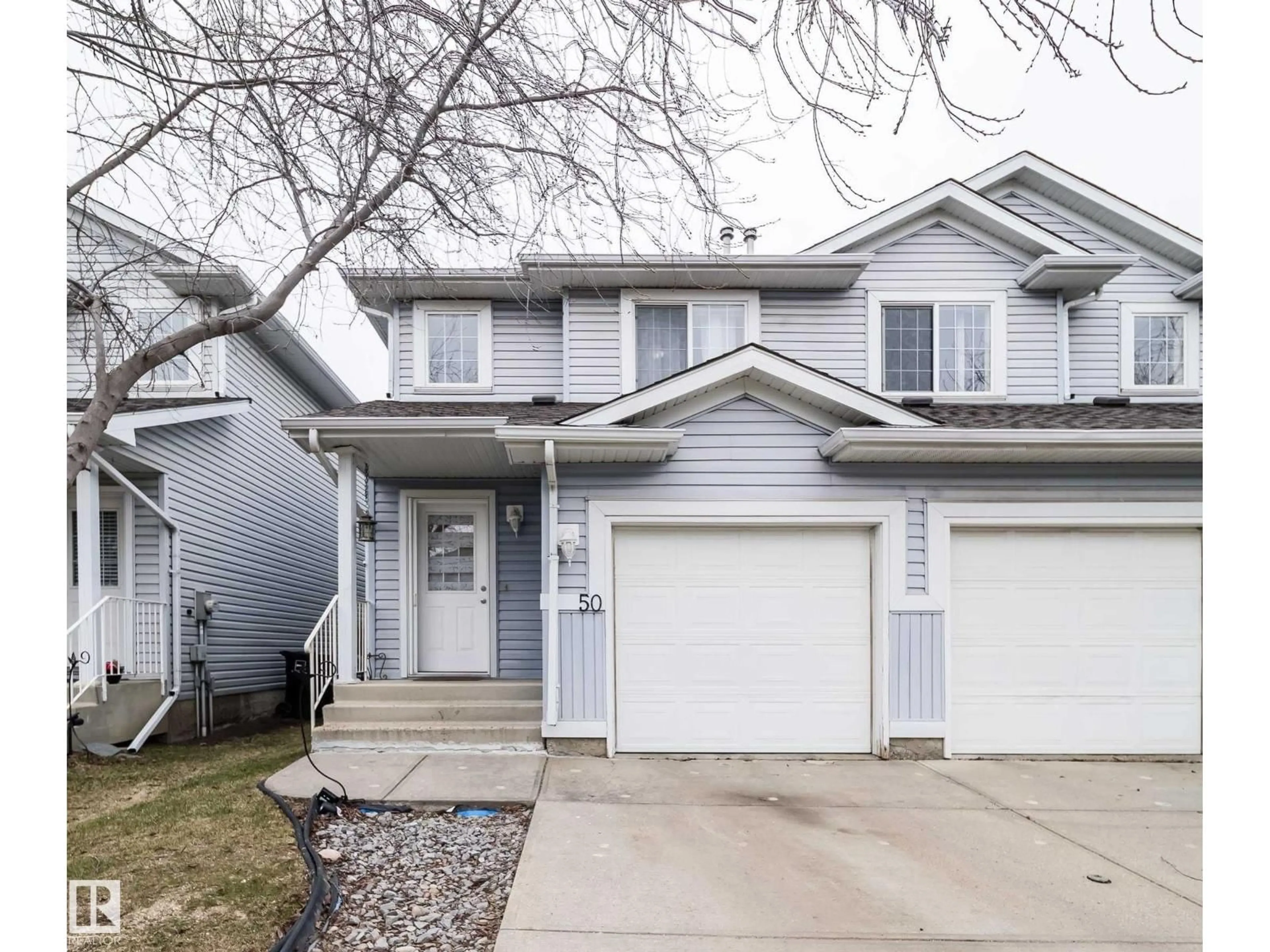 Home with vinyl exterior material, street for 14603 - 50 MILLER BV, Edmonton Alberta T5Y3B6