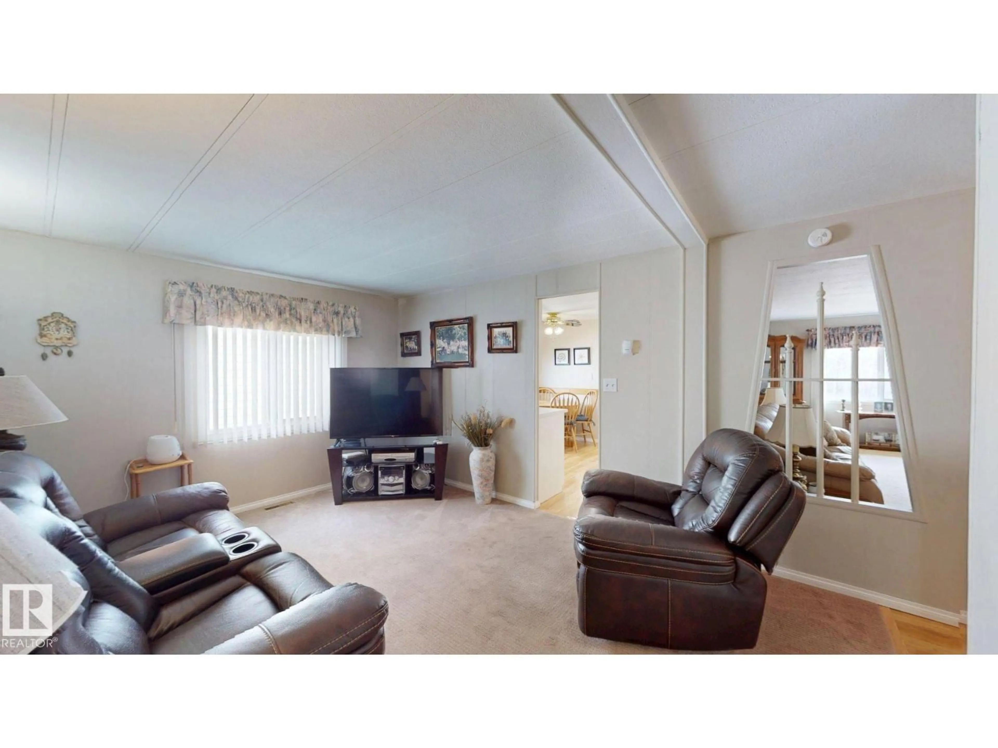Living room with furniture, unknown for 5020 43 ST, Drayton Valley Alberta T7A1B8