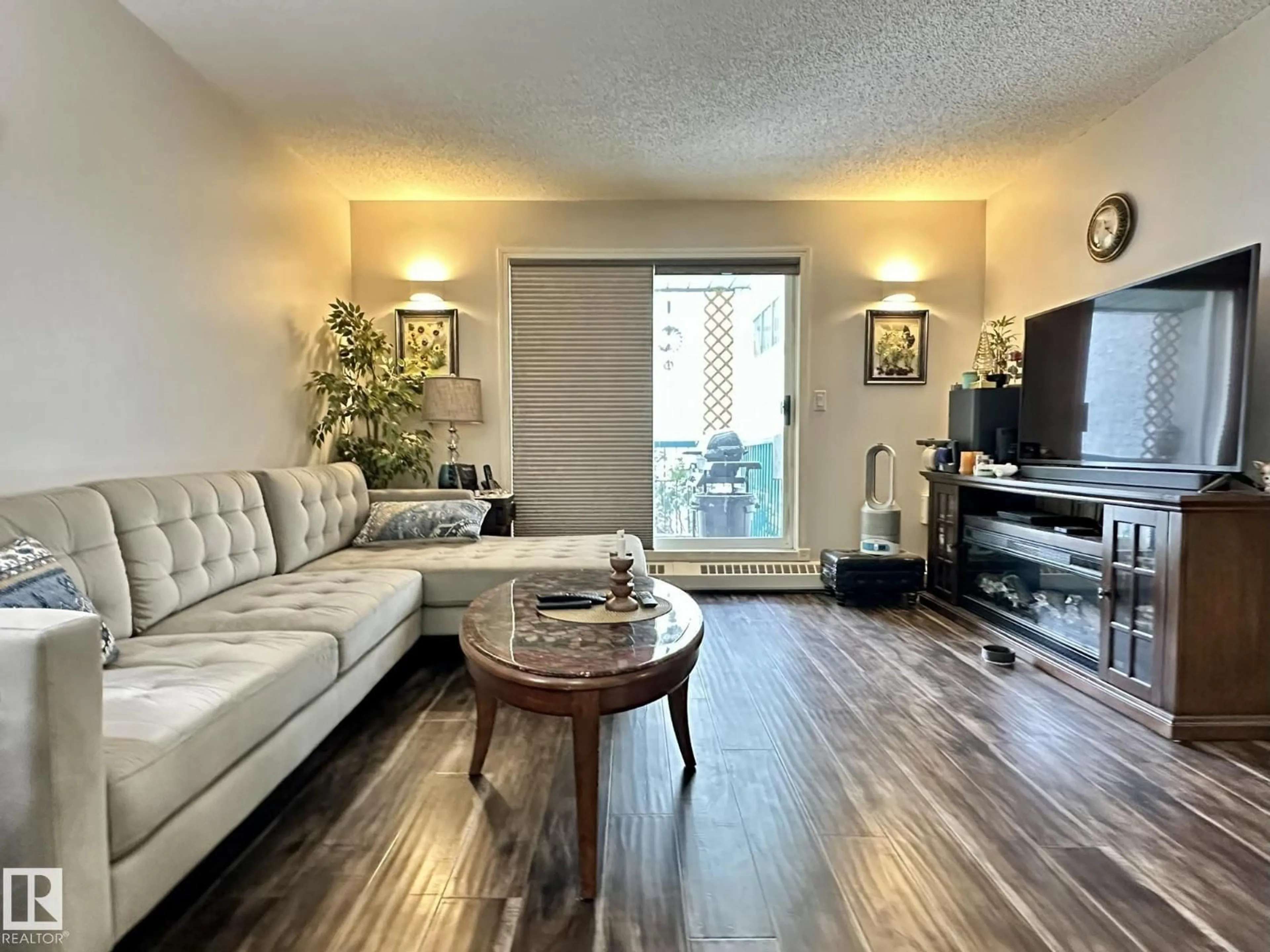 Living room with furniture, wood/laminate floor for 211 - 9619 174 ST, Edmonton Alberta T5T6C6