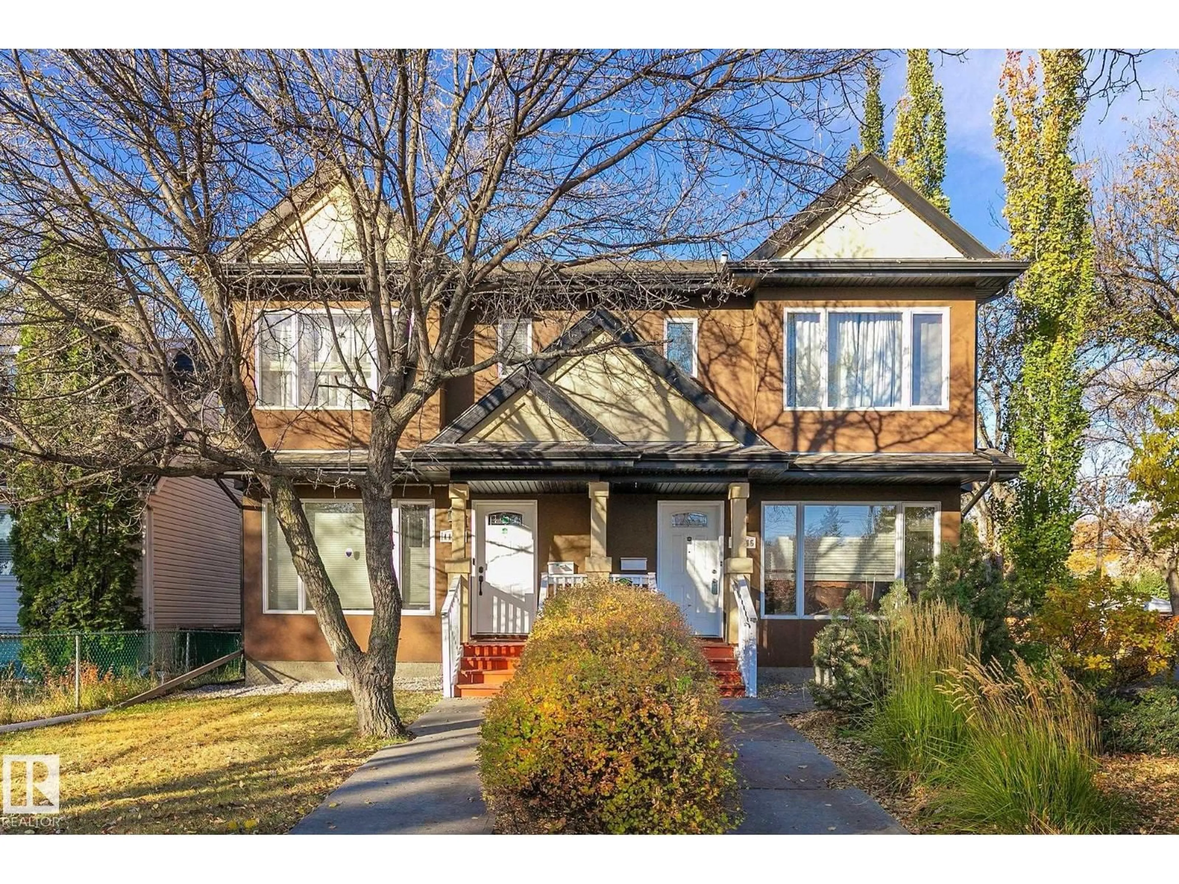 Home with brick exterior material, street for NW - 11844 125 ST, Edmonton Alberta T5L0R9