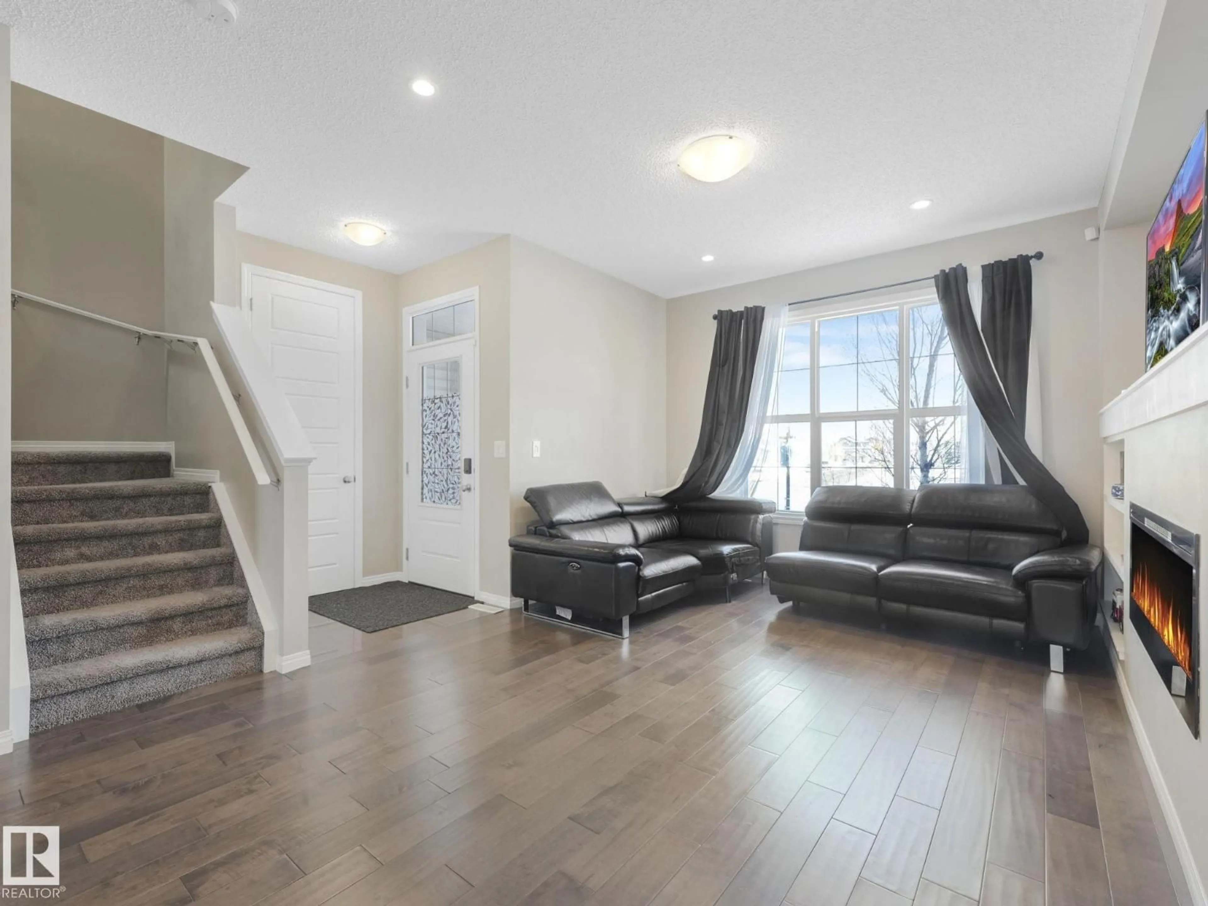 Living room with furniture, unknown for 8119 CHAPPELLE WY, Edmonton Alberta T6W3L7