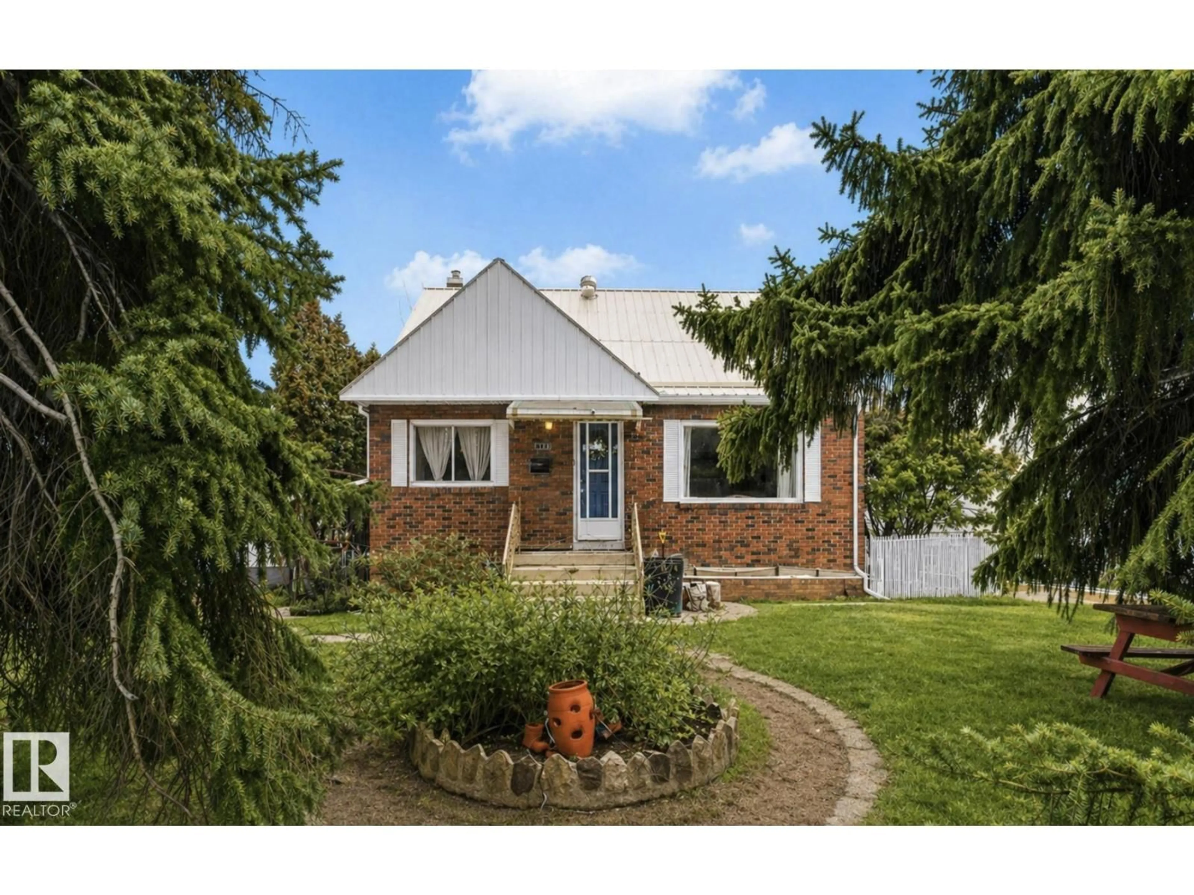 Home with brick exterior material, street for NW - 7703 77 AVENUE, Edmonton Alberta T6C0K6